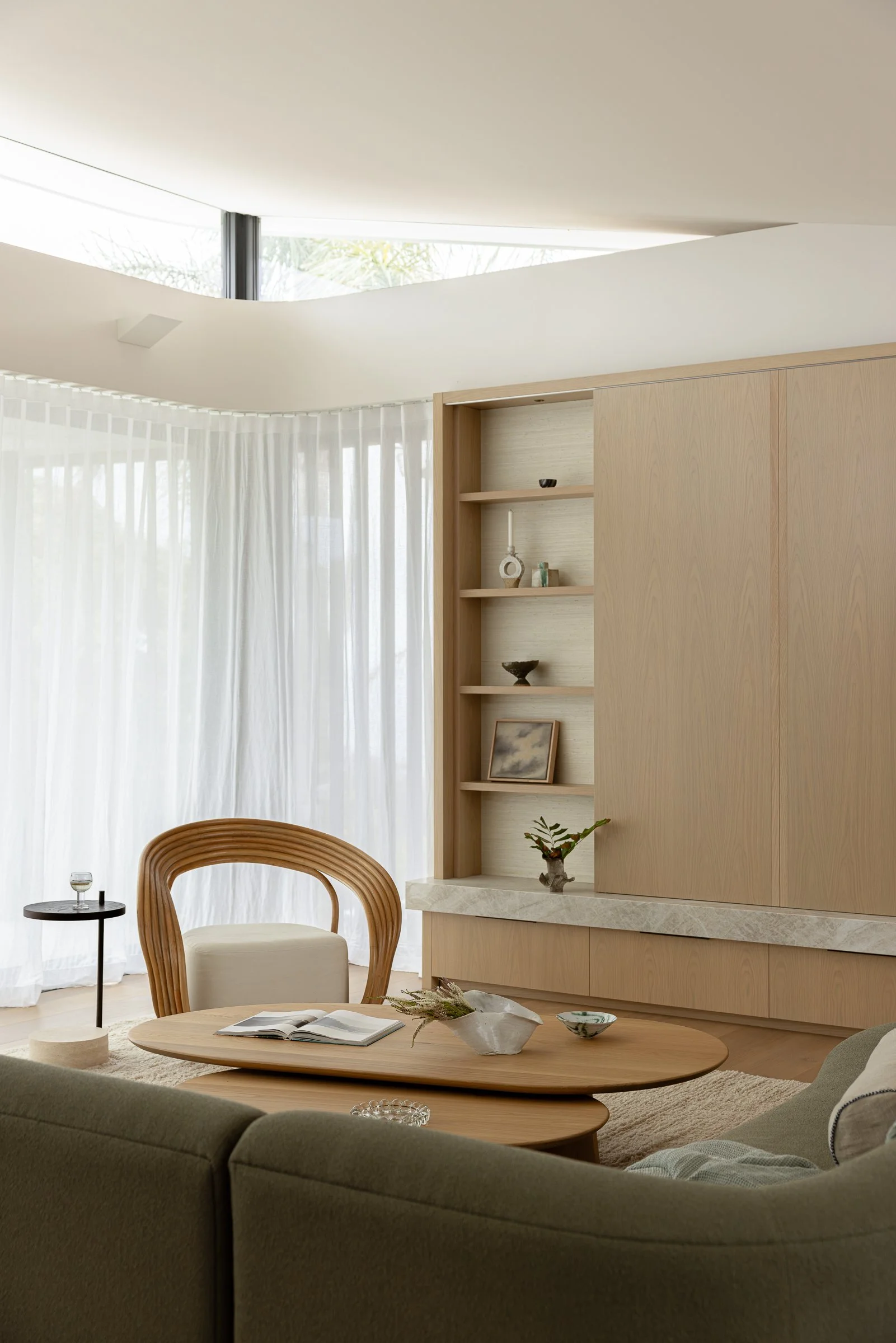 Open plan coastal living and dining room in Manly home