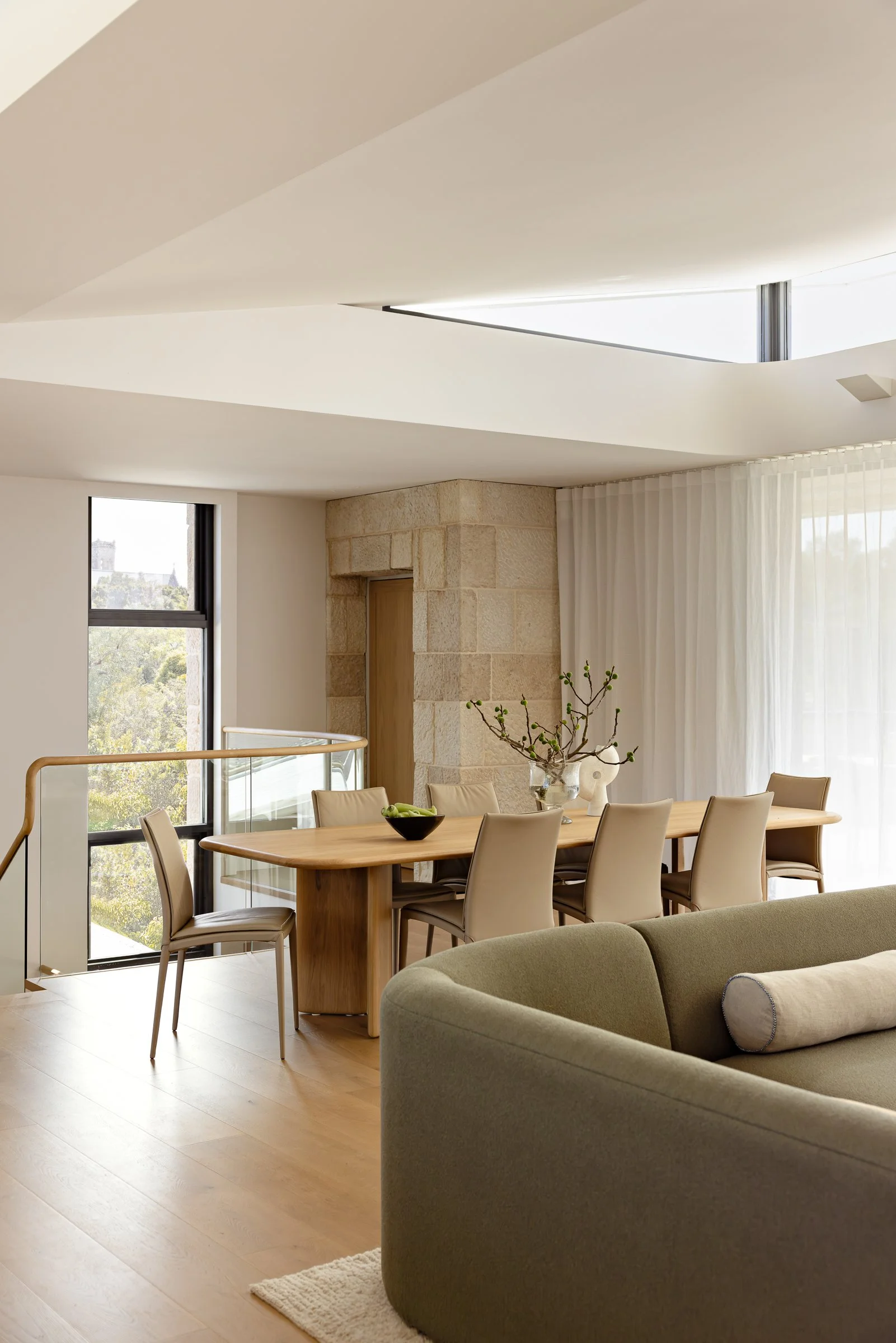 Luxury coastal living room overlooking Bower Beach by Cote Interiors