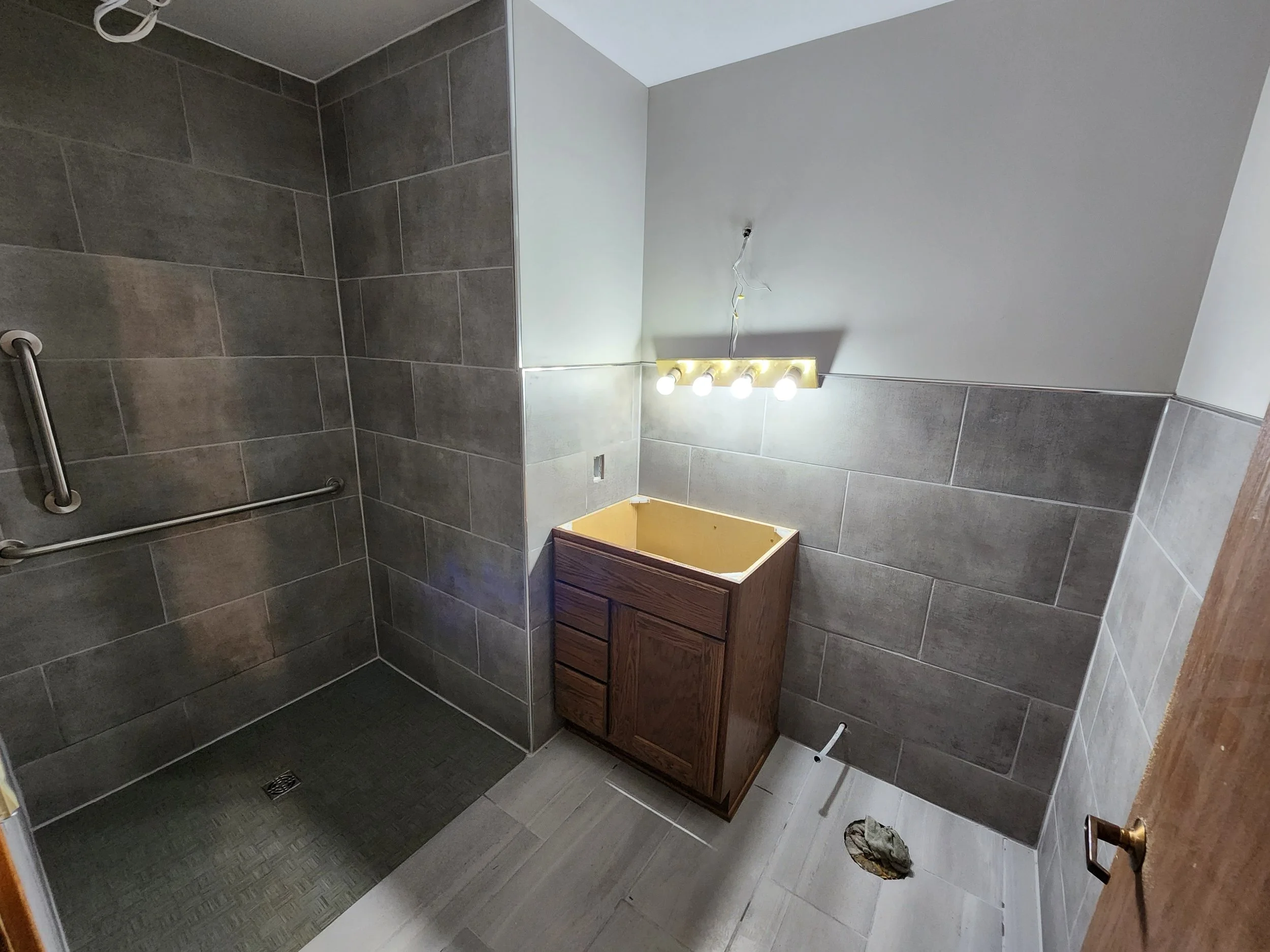 Curb less shower for assisted living