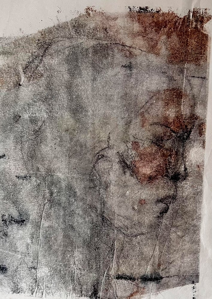 “Woman”.
She began to emerge on one of my silk surfaces. I enhanced her with charcoal, photographed her, then made a simple monotype with a transparency and rice paper. I find her poignant, although I have no idea where in time she is from or who