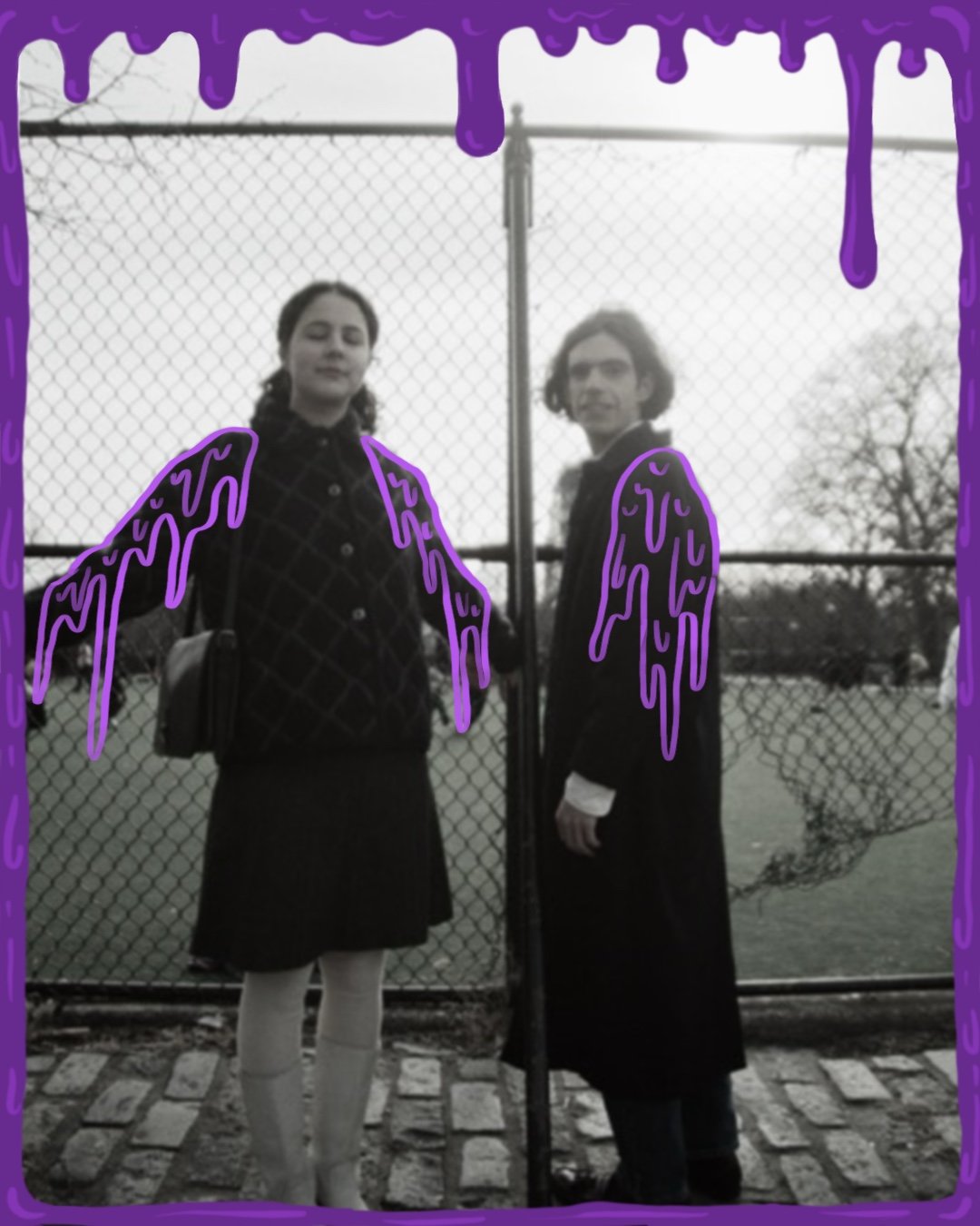 Dorio (Chad Doriocourt and Rachel Rascoe) stand in front of a chain-link fence