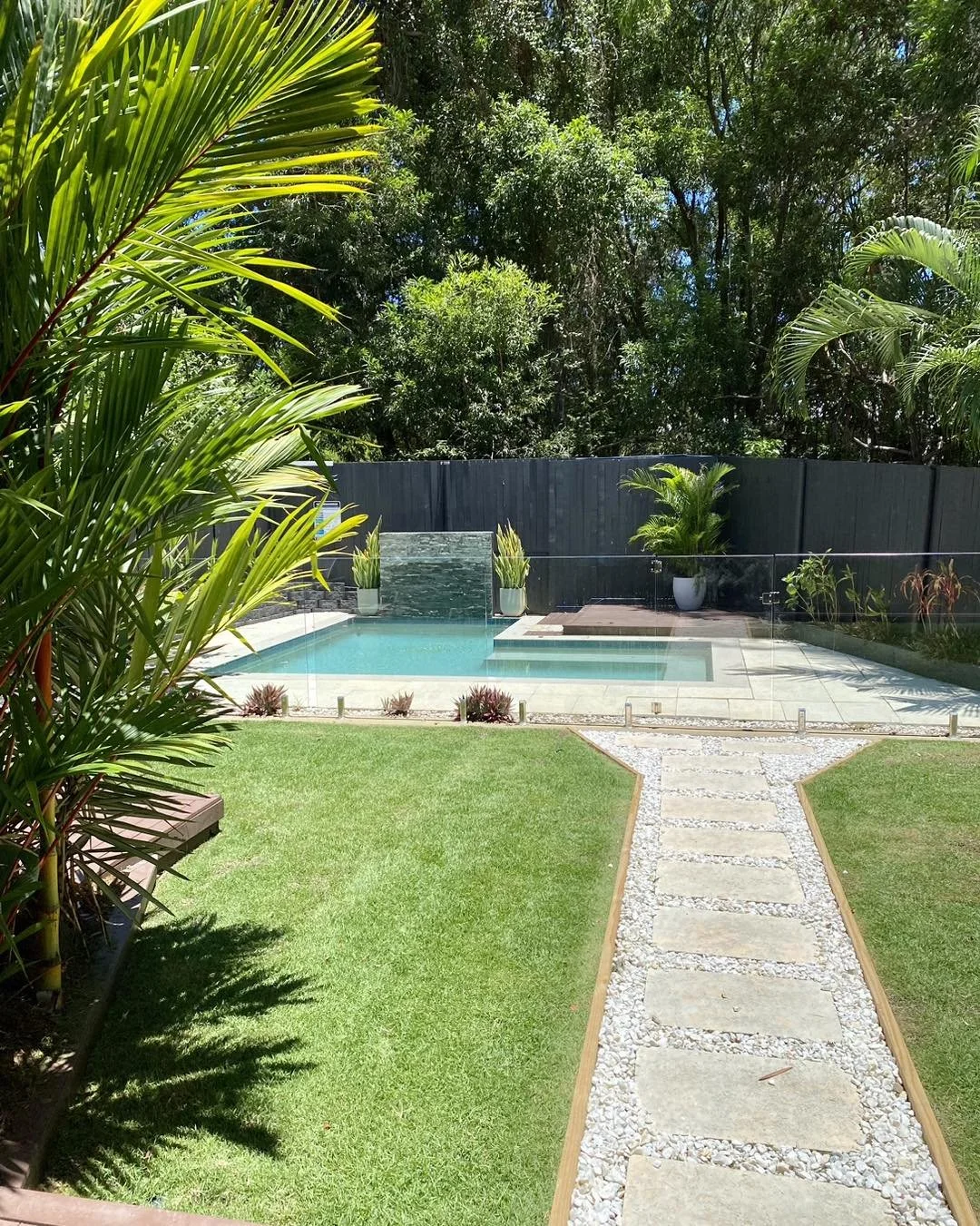 Residential property gardens maintained by Local Dad Lawn & Garden in Palm Cove, Cairns