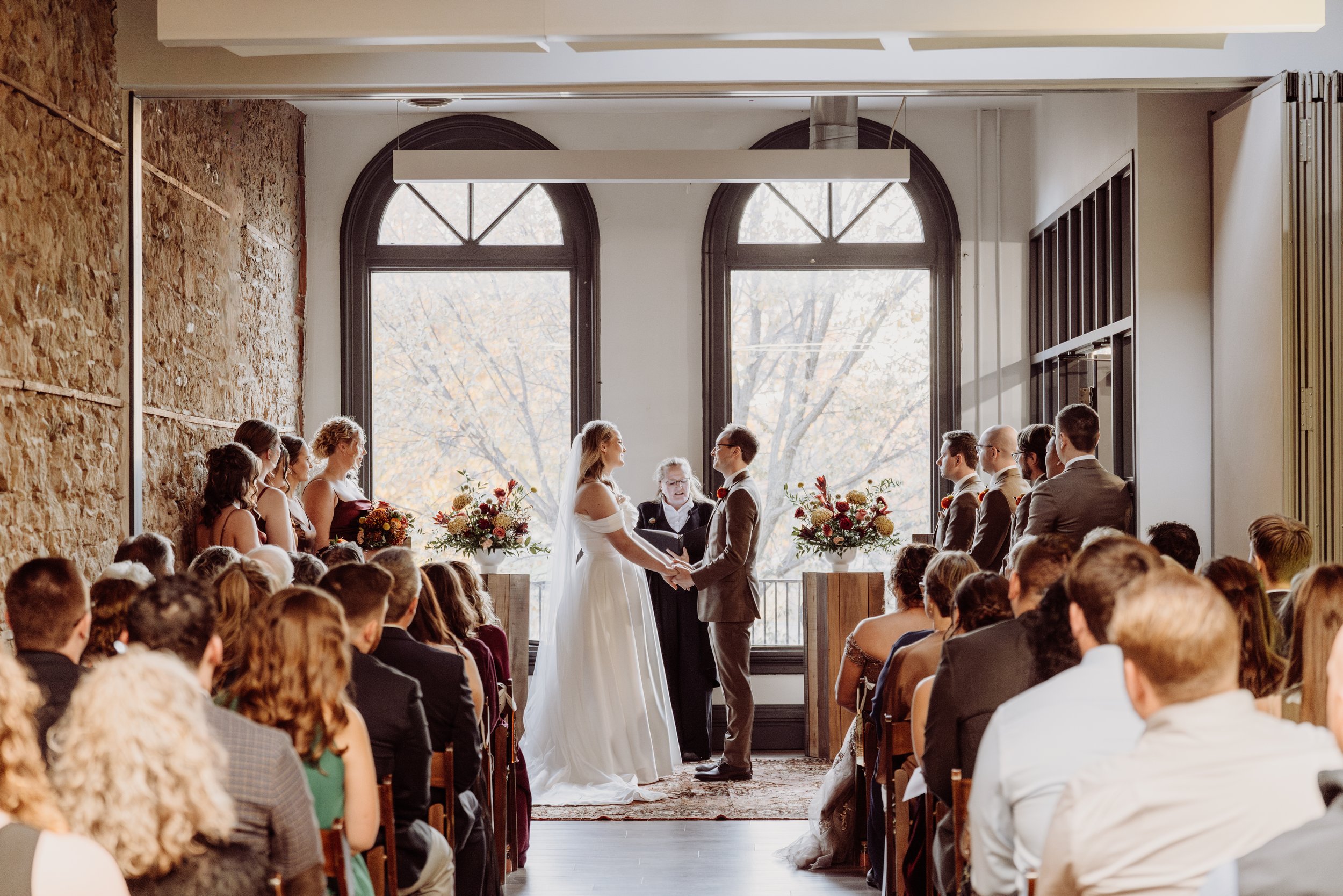 Luxury micro wedding ceremony in Wisconsin featuring an intimate couple and small guest group, showcasing an elevated 2026 wedding celebration