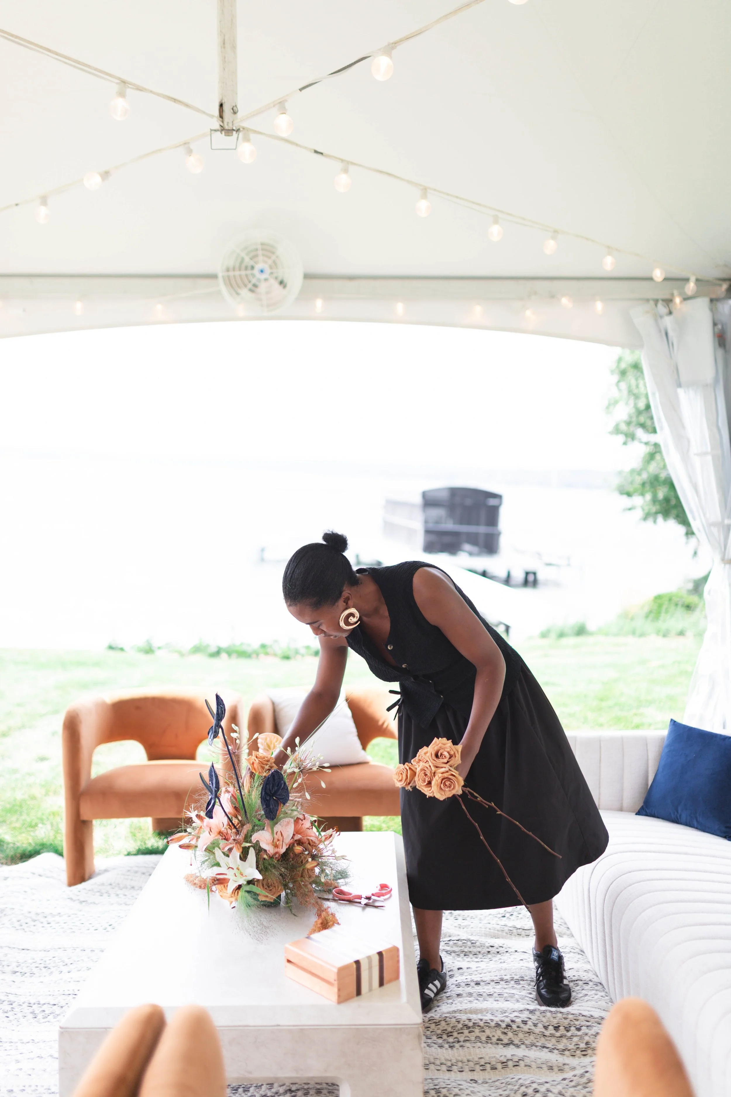 Behind-the-scenes of luxury micro wedding planning, including florals and table styling at an intimate Wisconsin venue, showing curated 2026 design elements