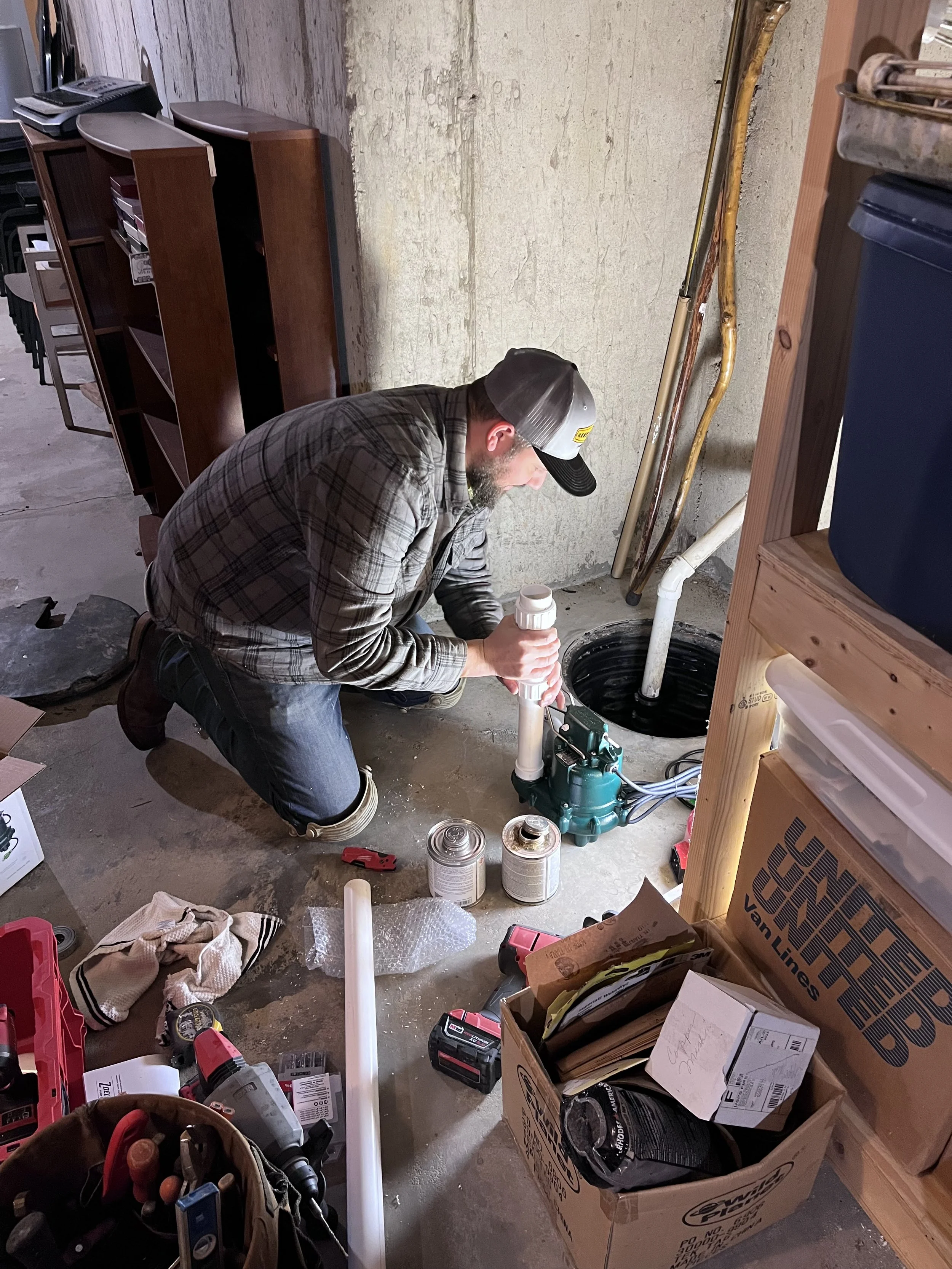 professional plumbing experts ramblewood plumbing installing sump  pump