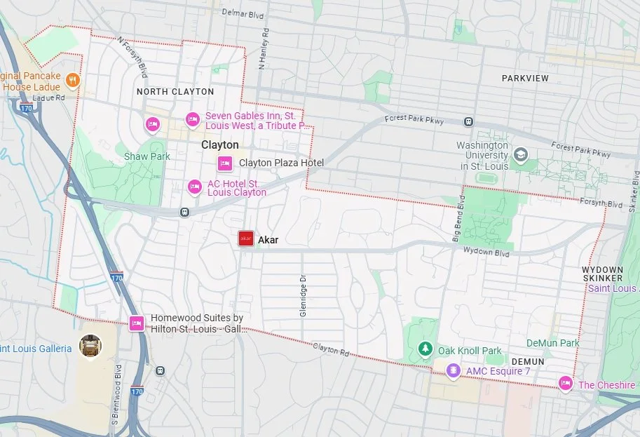 Map showing neighborhoods, parks, hotels, and landmarks in St. Louis, including North Clayton, Clayton, Akar, Demun, and Wydown Skinker.