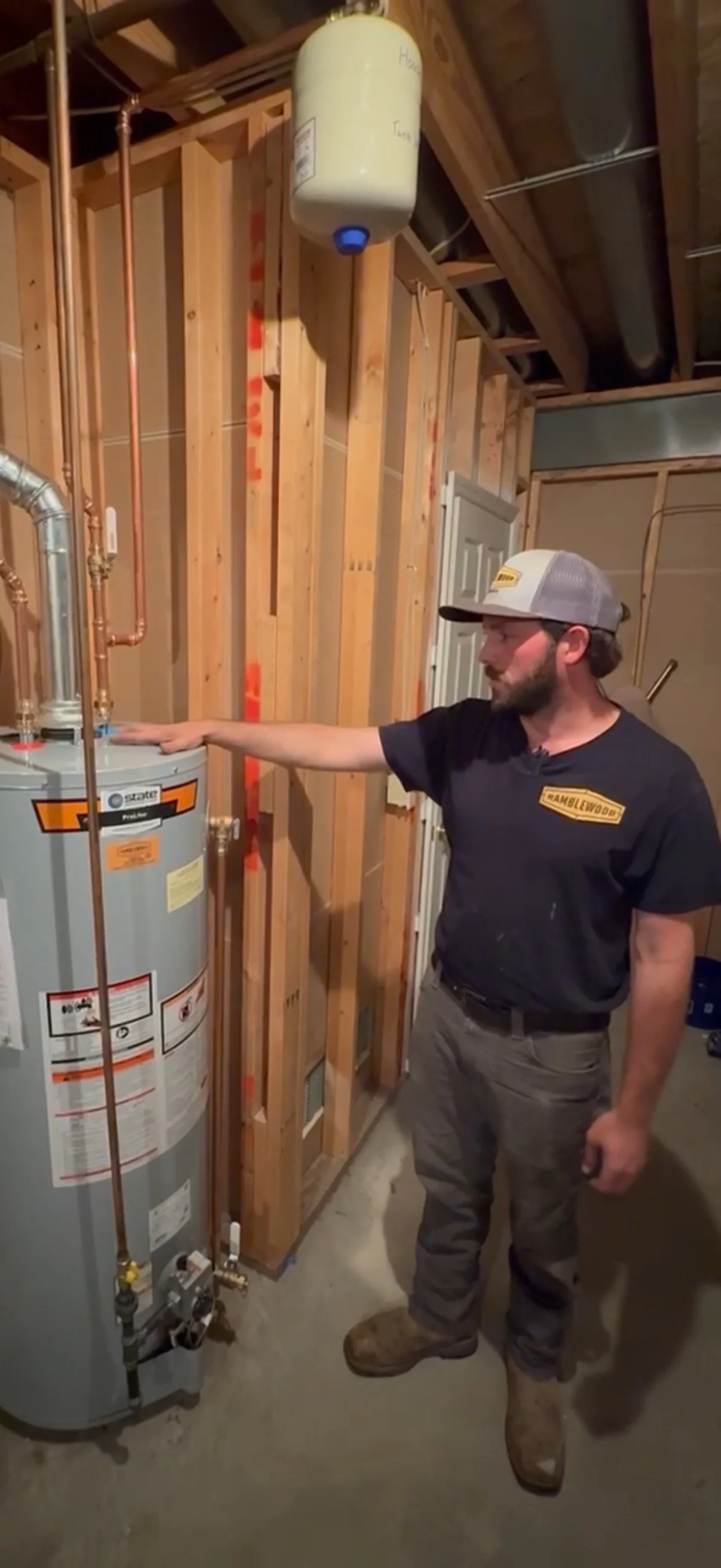 jameson perkins a journeyman plumber replaces a water heater in st. louis mo for ramblewood plumbing compnay