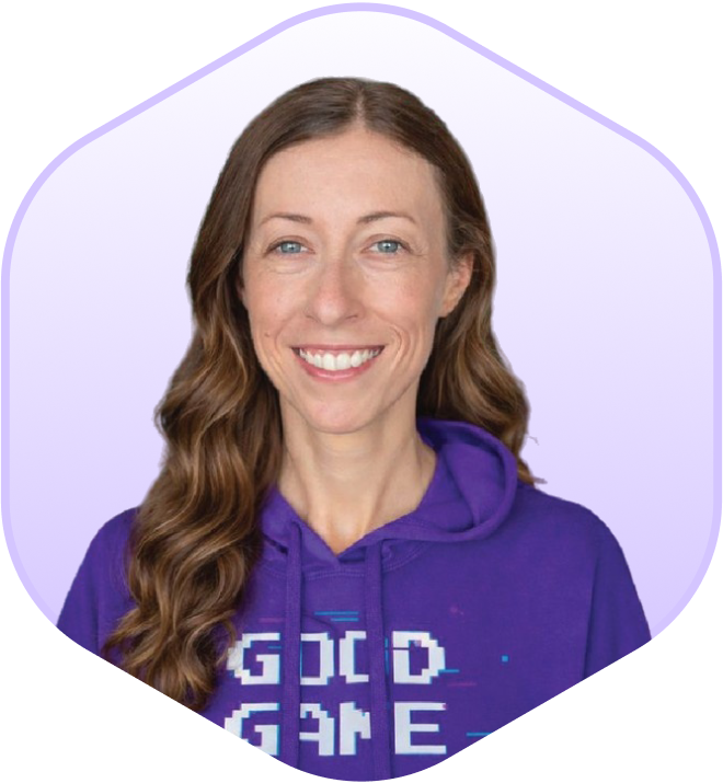 Smiling therapist in a purple "Good Game" hoodie against a digital, blocky background.