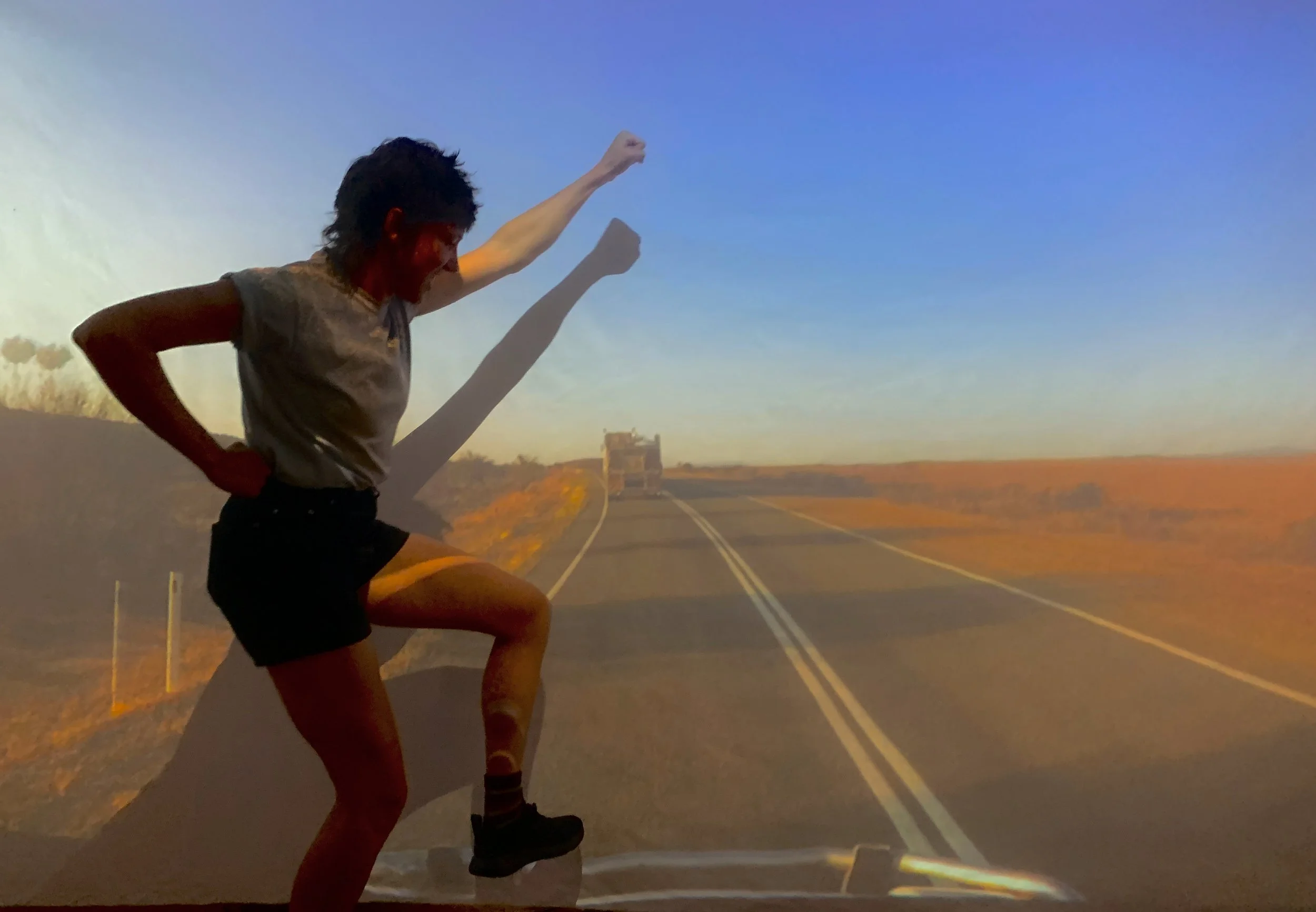  
The Road: is a 15 minute video art work which offers the visitor an immersive (projected) experience. The piece explores visually and musically the mental unraveling one experiences moving from urban landscapes into the expansiveness of ancient Aus