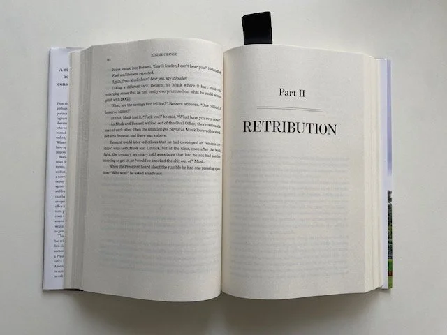Book is opened on Part two of the volume, titled Retribution.