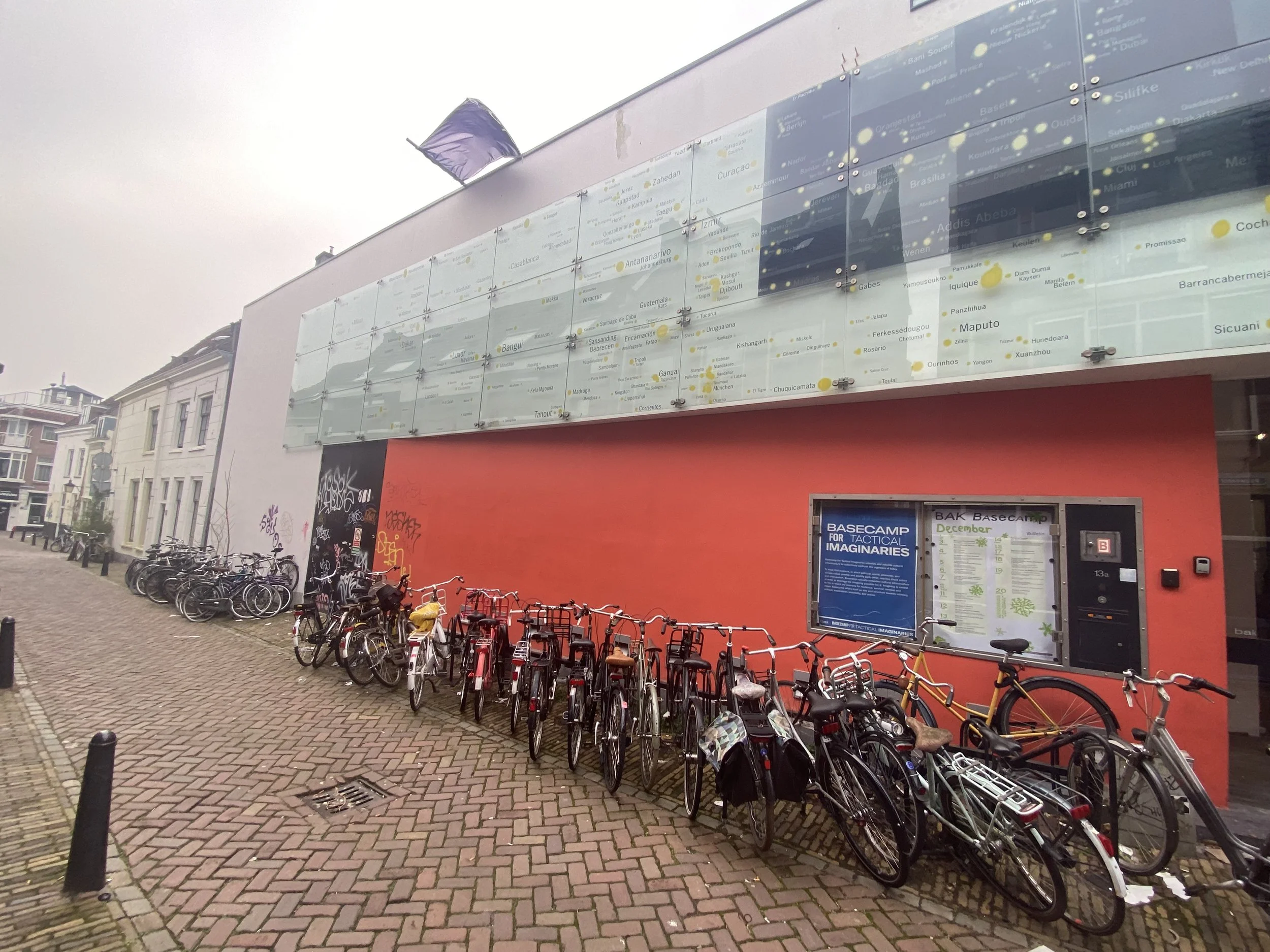 A typical dutch street with around fifty bikes.