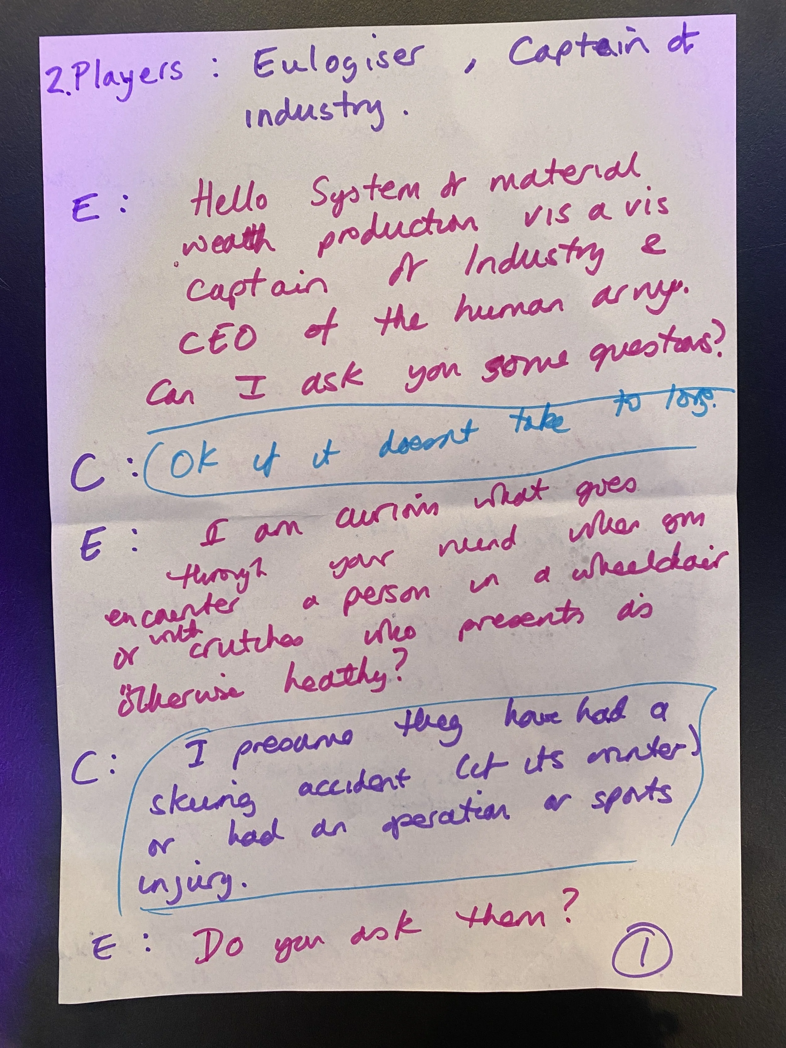 Transcribed conversation on paper with red, purple and blue text. It’s about capitalism and u can read the hypocrisy of the capitalist.
