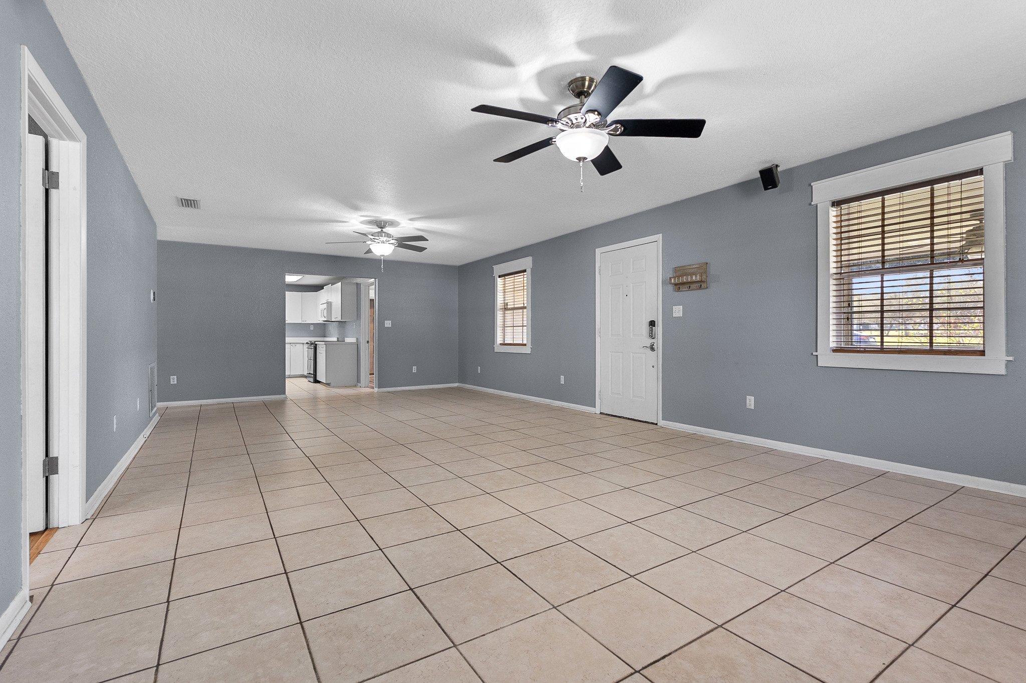 Living & Dining Room - Tile, Window Treatments, Surround Sound