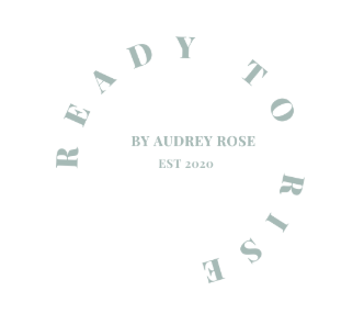 Minimalist logo for 'Ready to Rise' by Audrey Rose, established 2020, with circular text arrangement.