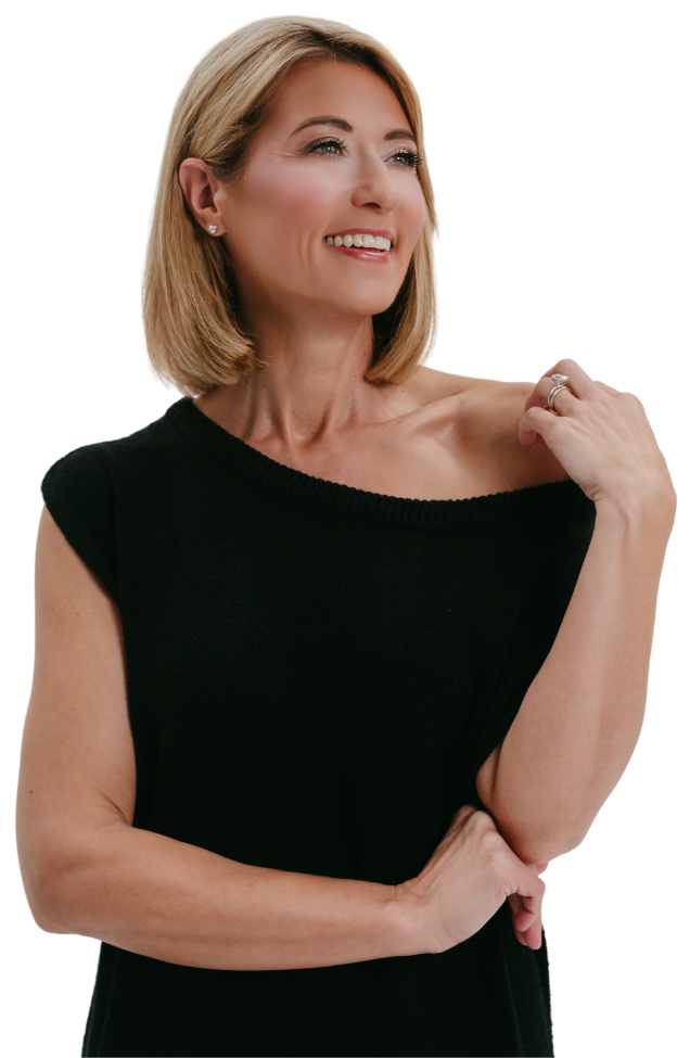 Portrait of a smiling woman with blonde hair, wearing a black top, looking to her right.