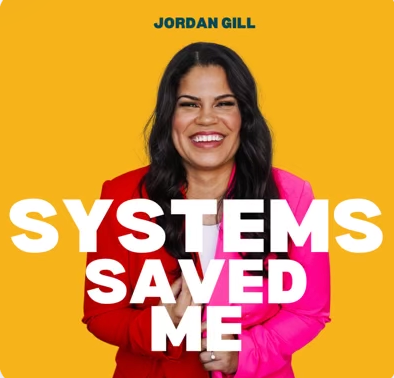 Book cover for 'Systems Saved Me' by Jordan Gill, featuring a smiling woman with dark hair, wearing a red blazer over a pink shirt, against a yellow background.