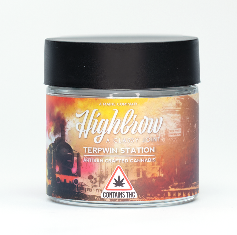 A jar of Highbrow Terpwin Station artisan crafted cannabis with a black lid and a colorful label featuring a train and a sunset background, containing THC.