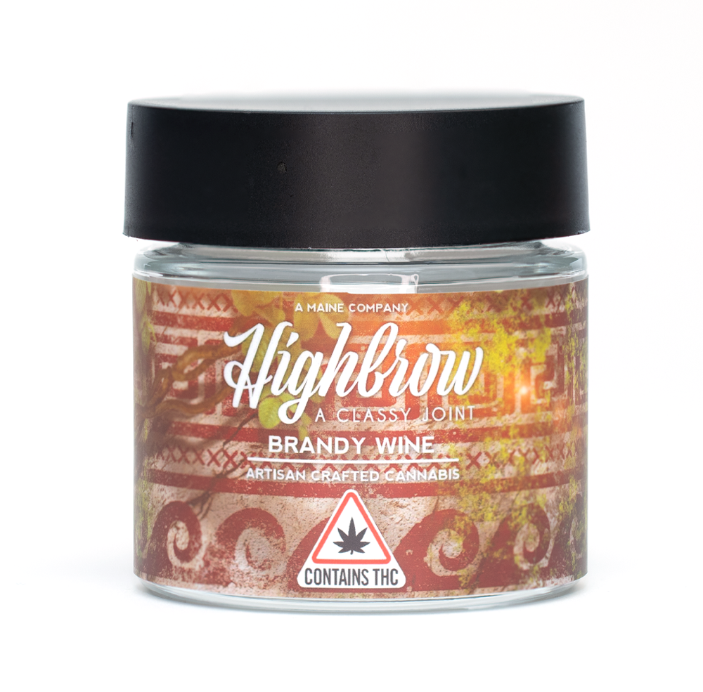Jar of cannabis-infused product labeled 'Highbrow, a classy joint, brandy wine, artisan crafted cannabis, contains THC' with a black lid, featuring a colorful, artistic label with a warning symbol at the bottom.