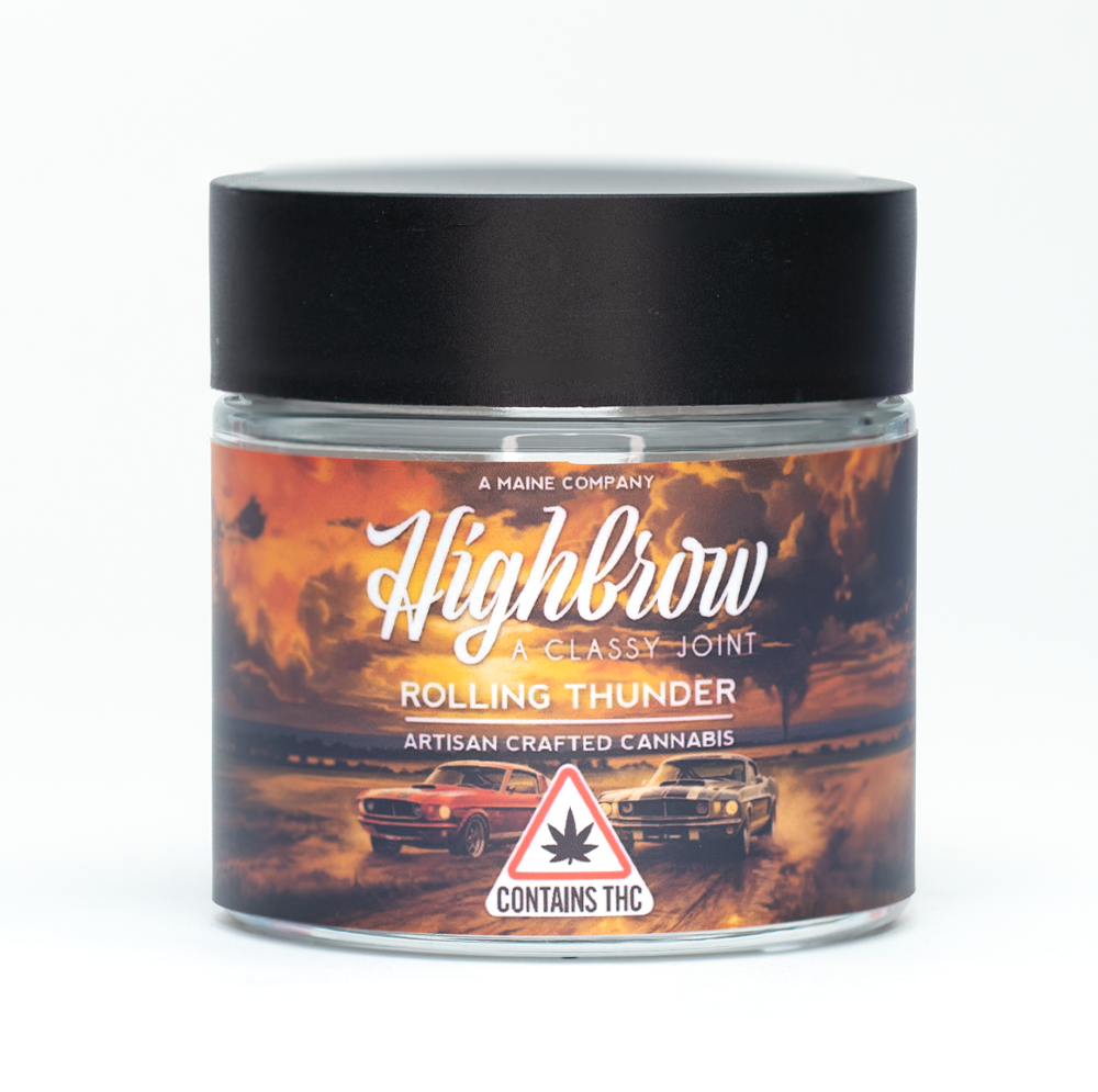 A glass jar with a black lid containing artisan crafted cannabis labeled 'Highbrow Rolling Thunder' with cars on a road during a sunset with dark clouds and a THC warning label.