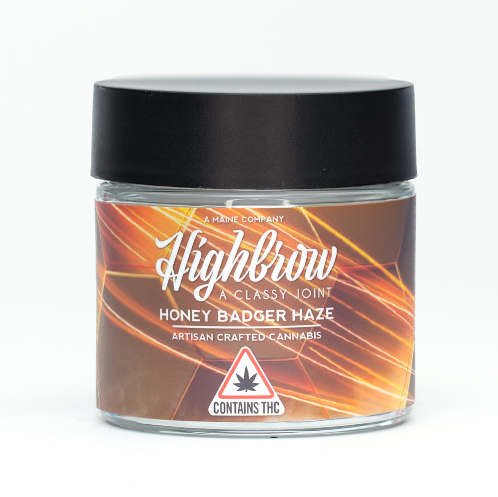 Jar of Highbrow Honey Badger Haze cannabis with THC warning label.