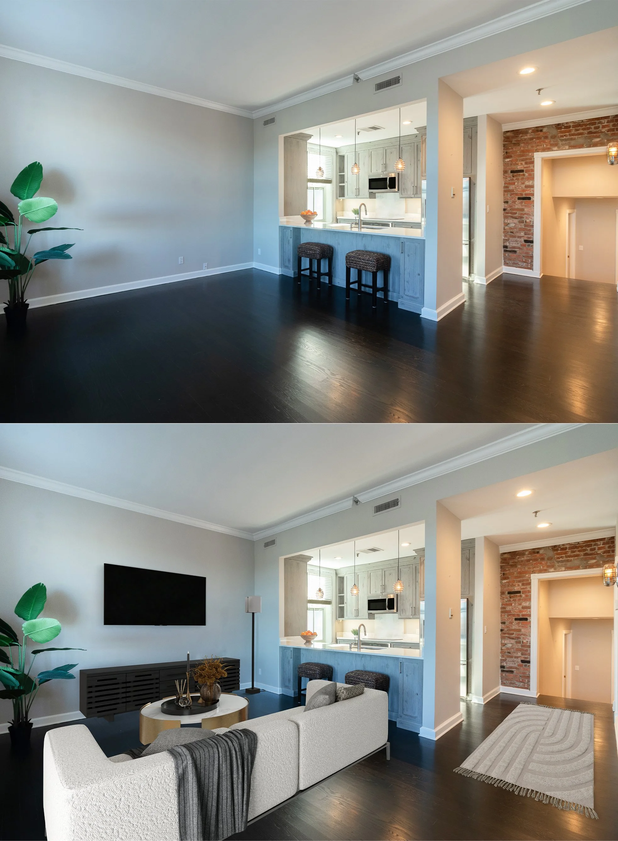 Spacious open-concept living room with a dark hardwood floor, light-colored walls, a large flat-screen TV, a white sofa with a blanket, a black TV console, a tall floor lamp, and a potted plant; view into the kitchen with light cabinetry and pendant 