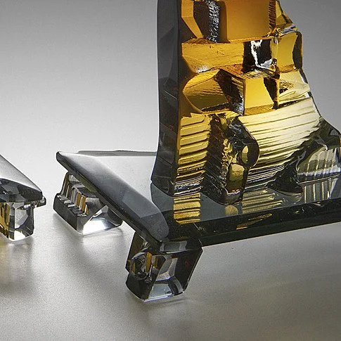 Stacked honey gold hand blown and cast glass creating two vertical forms that are topped off with brass candle holders, by award winning master craftsman Michael Mikula, of Cleveland Ohio-005.JPG