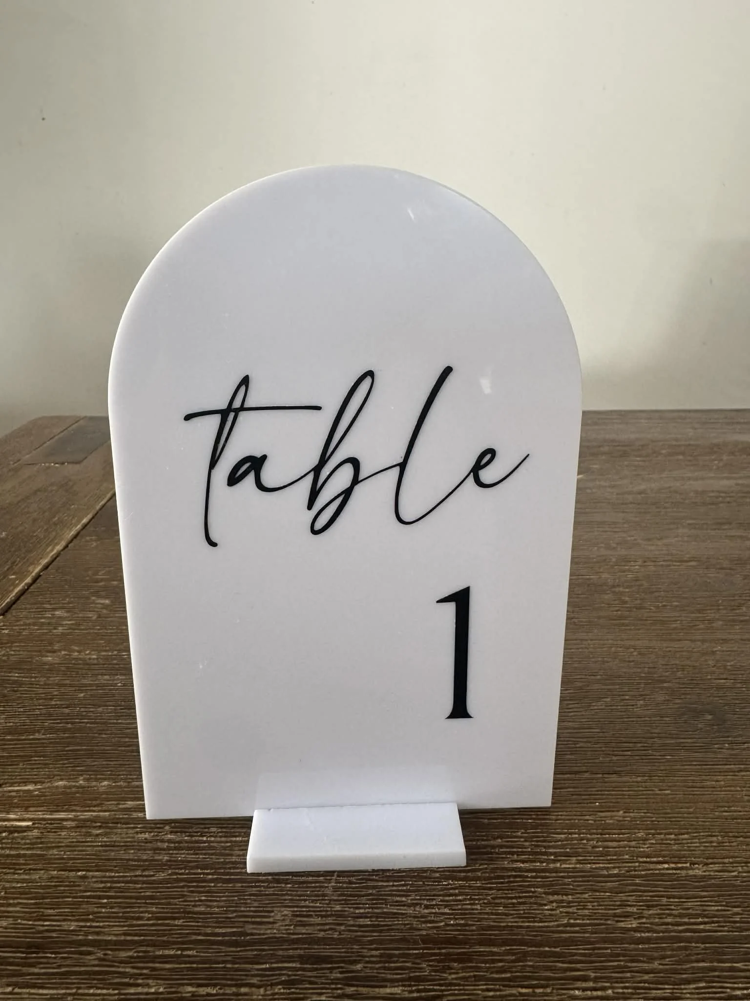 Arched-white-acrylic-table number-rental-1.jpg