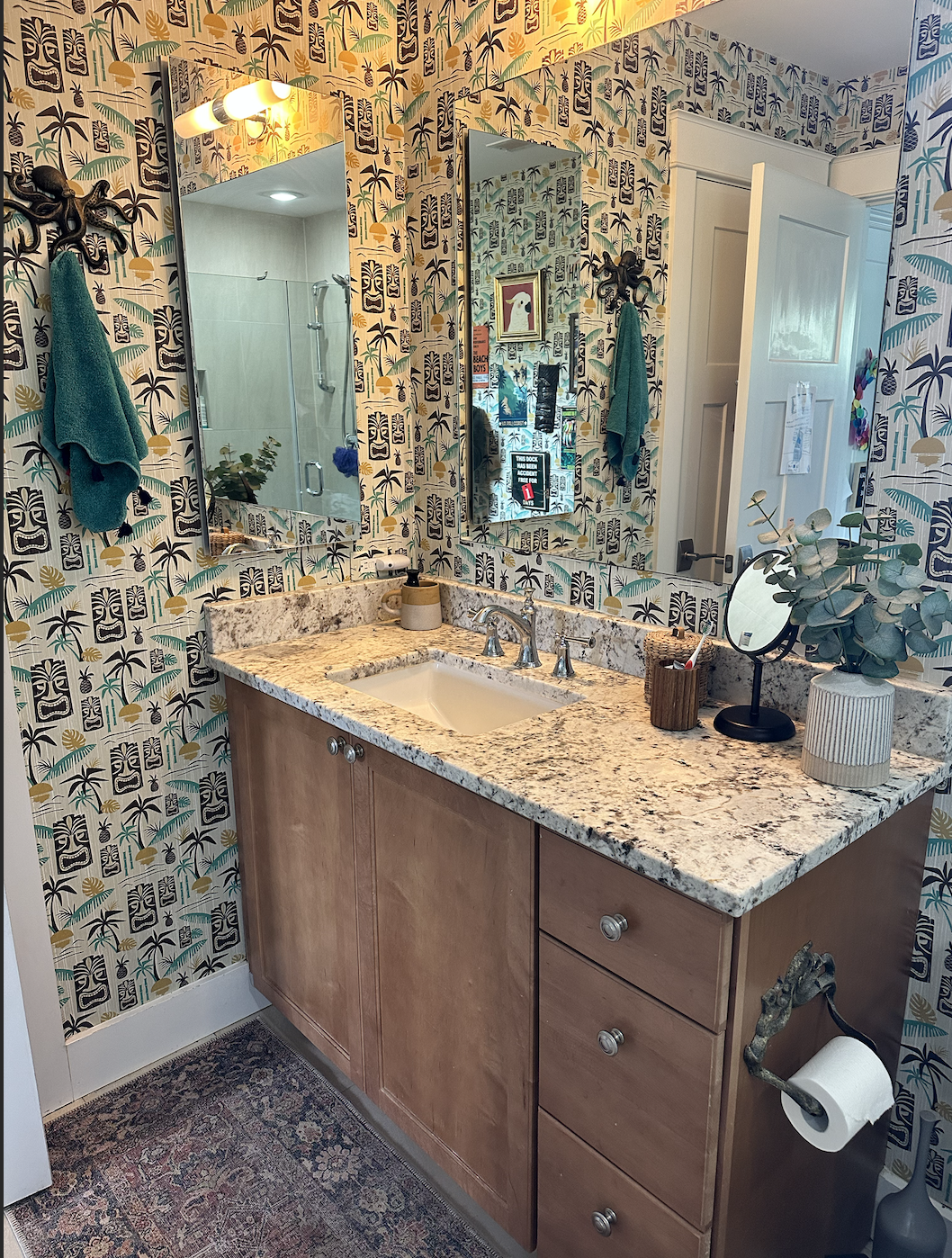 AFTER: This tiki wallpaper from Spoonflower was phenomenal to work with and two years later, has held up really well! 