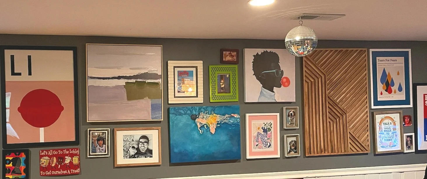 This is a basement rec room so not a child's bedroom per se, but the kids do spend a LOT of time here. I love the mix of color, different frames and canvases, and the natural wood on the larger piece at right. 