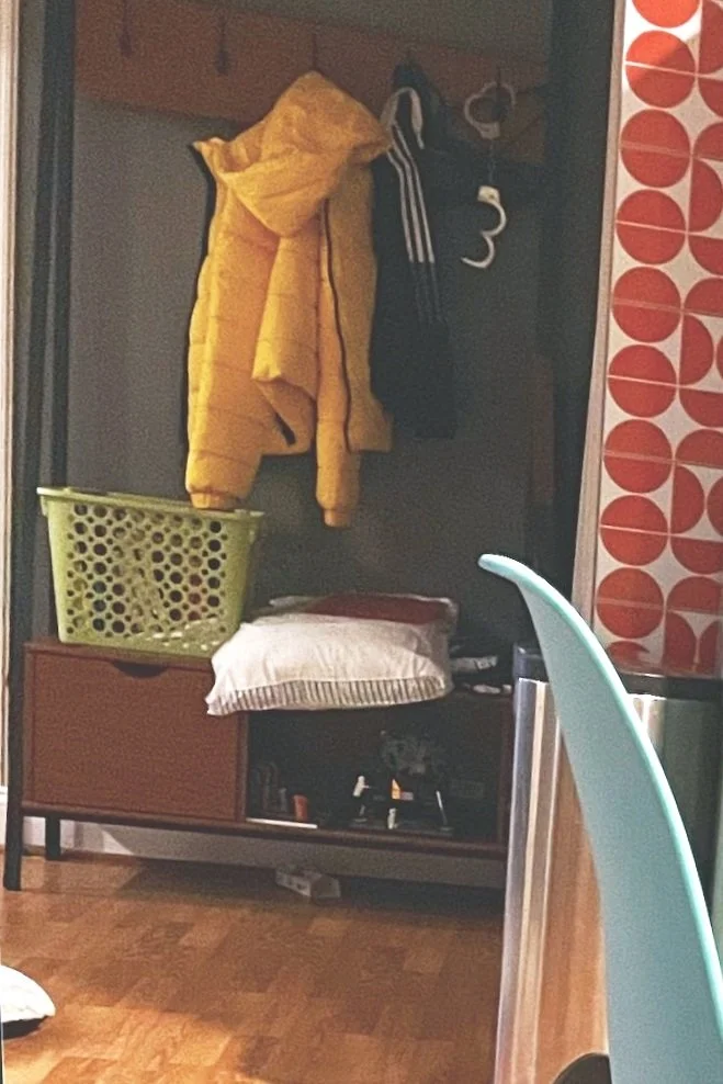 BEFORE: a basement corner outside the laundry room that collects all the random stuff from the household