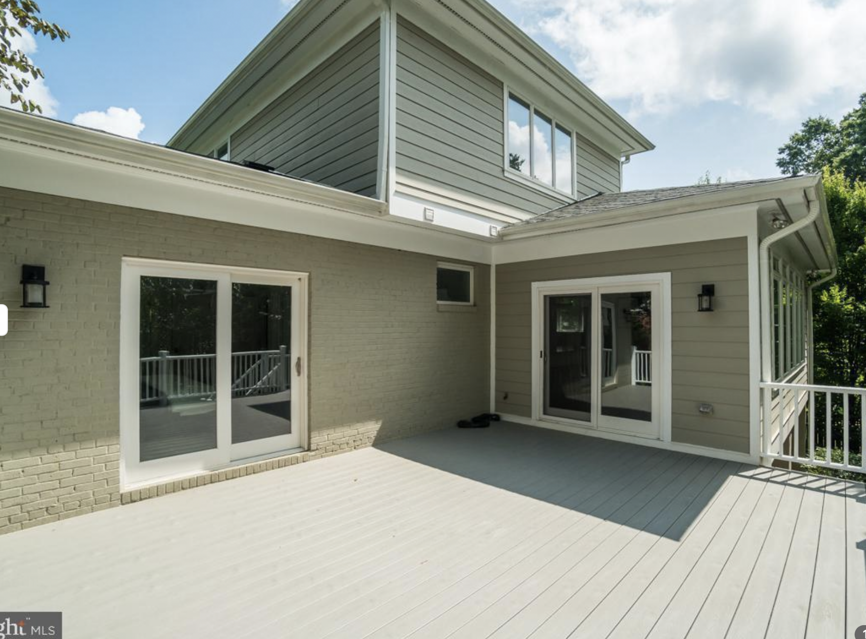 BEFORE: Who doesn't love a nice big deck right off the main living area? It's hard to figure out how to arrange something like this, however. 