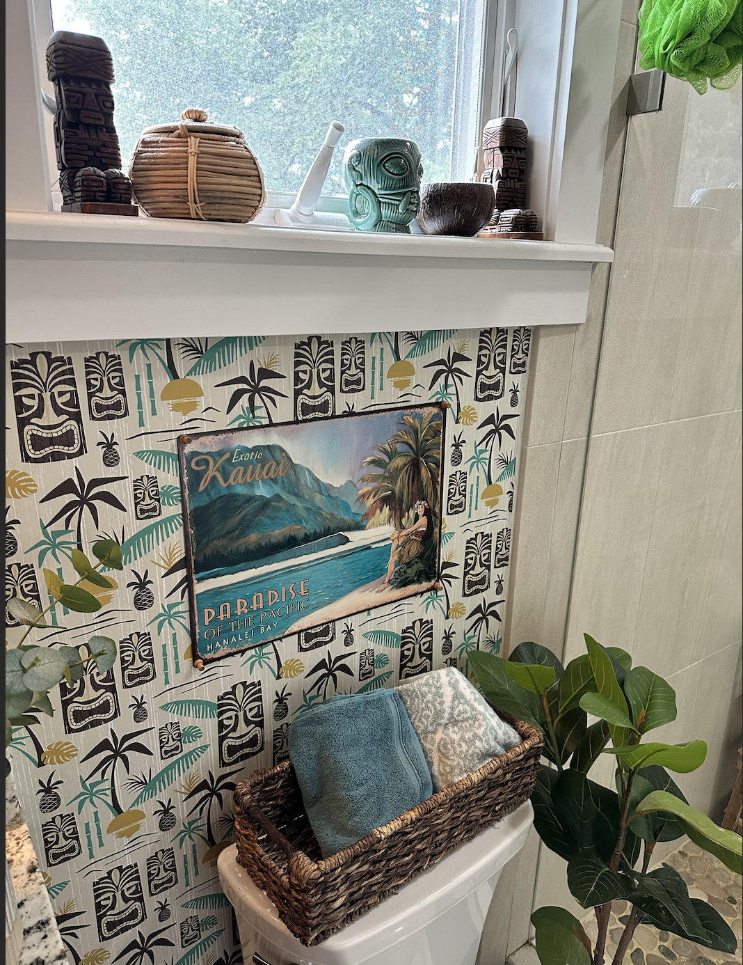 AFTER DETAIL: Some natural materials like wood and basketry on the windowsill and the countertop (next photo) warmed up the space [the tiki-like statues on the ends are actually heirlooms from the owner's Bolivian mother]