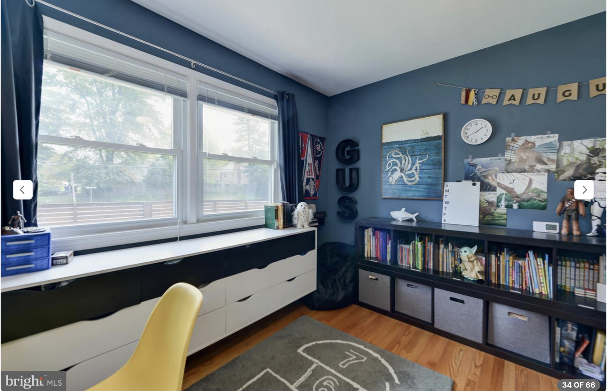 AFTER: a little boy's room with low (less tipping risk, but still anchor everything!) cube storage for books and bins of toys, and my favorite hopscotch rub from CB2