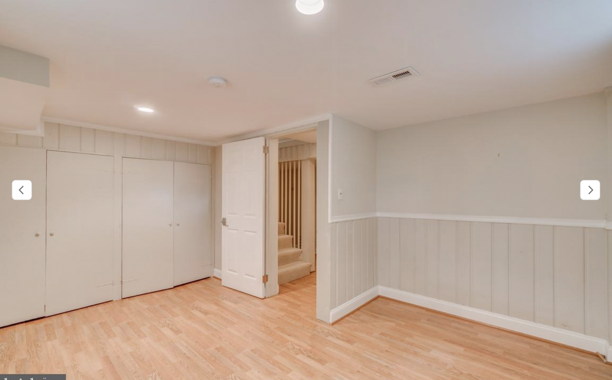 BEFORE: a basement bedroom reminiscent of a jail cell. Note the PLYWOOD closet doors that make up the entirety of one wall (at left). This was to be the bedroom of a teenage girl who is obsessed with antiques and asked for a "Moody, opium den vibe, w