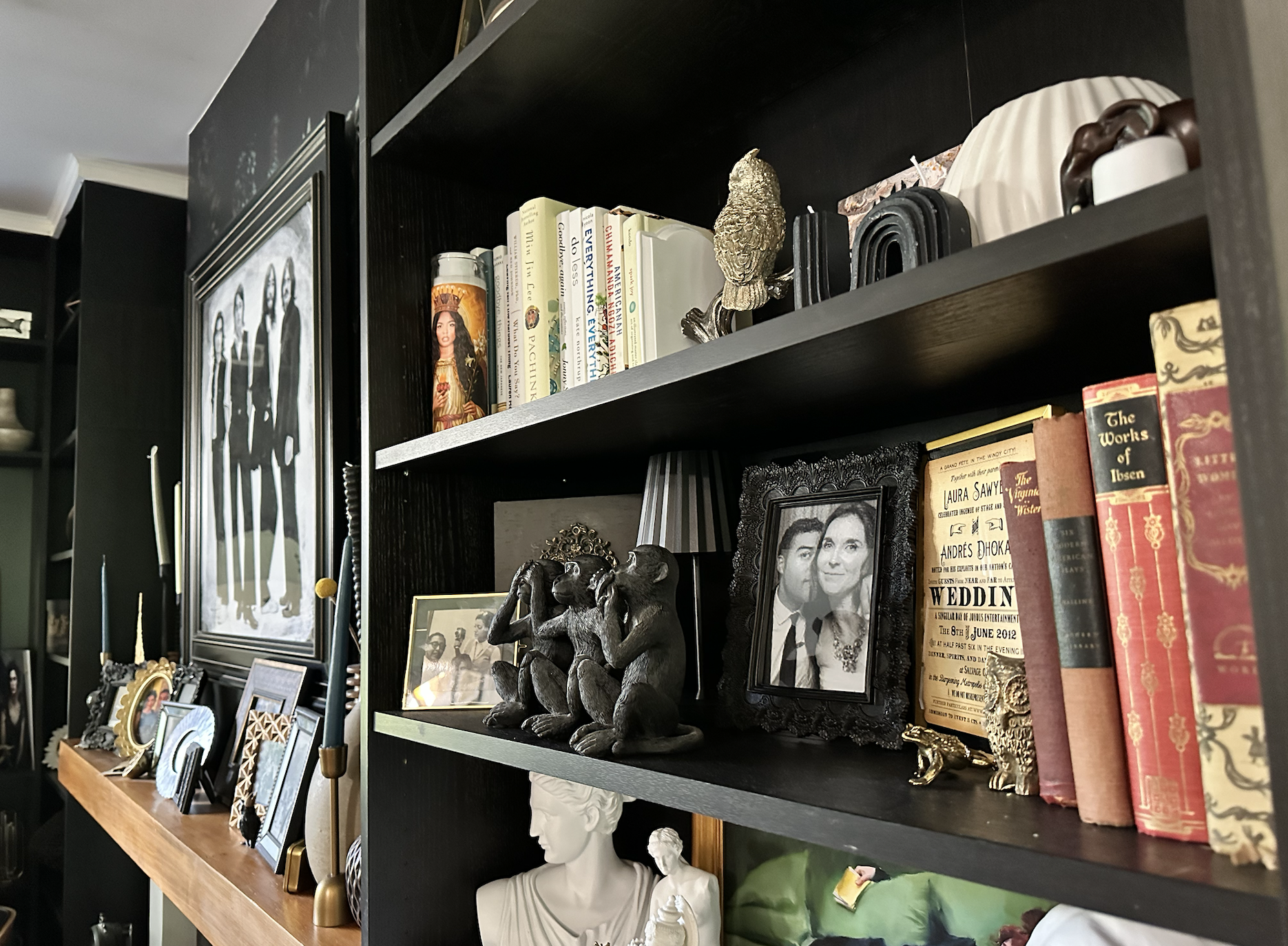 BEST OF ALL, this project didn't cost what it would cost to have a handyman custom-make built-in bookshelves. These, my friends, are IKEA "Billy" bookshelves, which I assembled and anchored to the wall and had my handyman cut and affix trim to the to