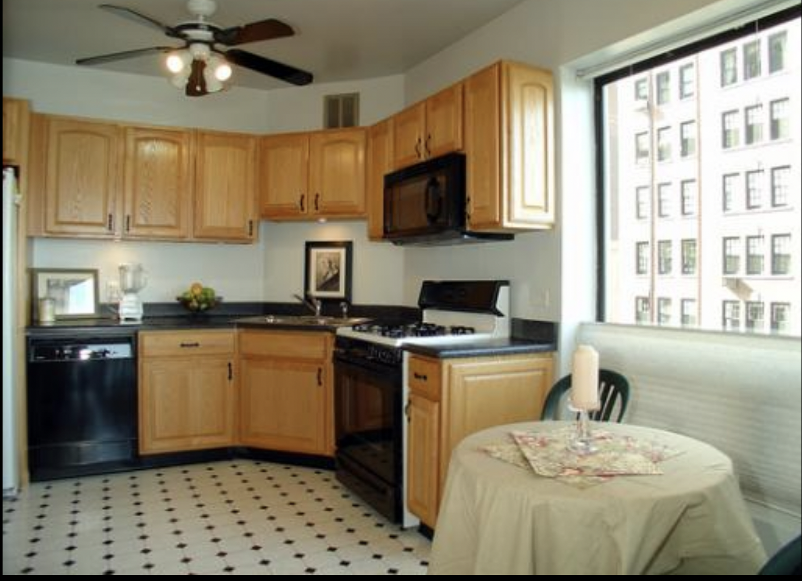 BEFORE: one of my very first design projects, a high-rise apartment kitchen in Chicago, right on Lake Shore Drive overlooking Belmont Harbor. This kitchen was so dated before I got to it - not sure if I was more appalled by the linoleum floor or the 
