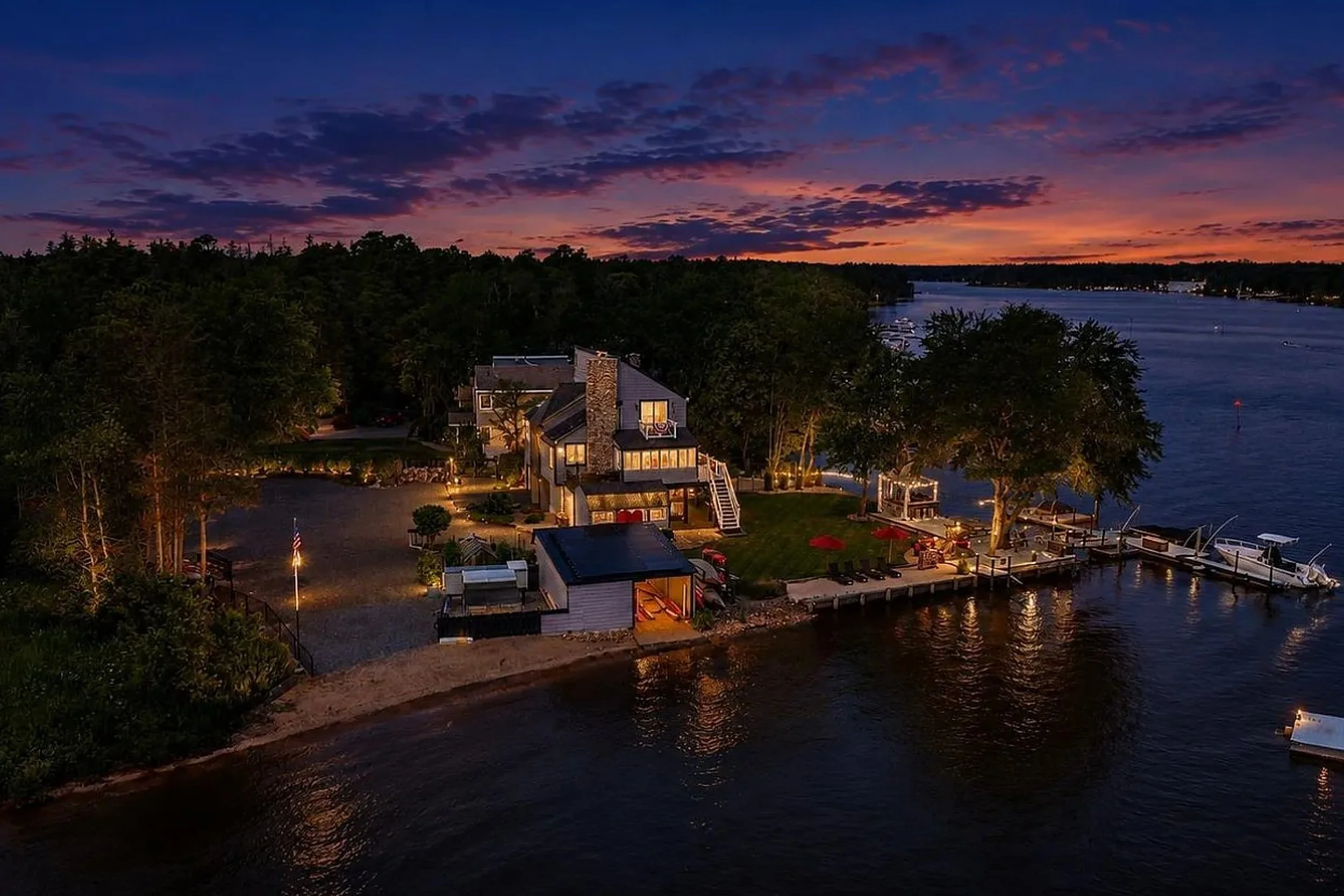 Aerial view of the private riverfront estate at 5344 River Drive
