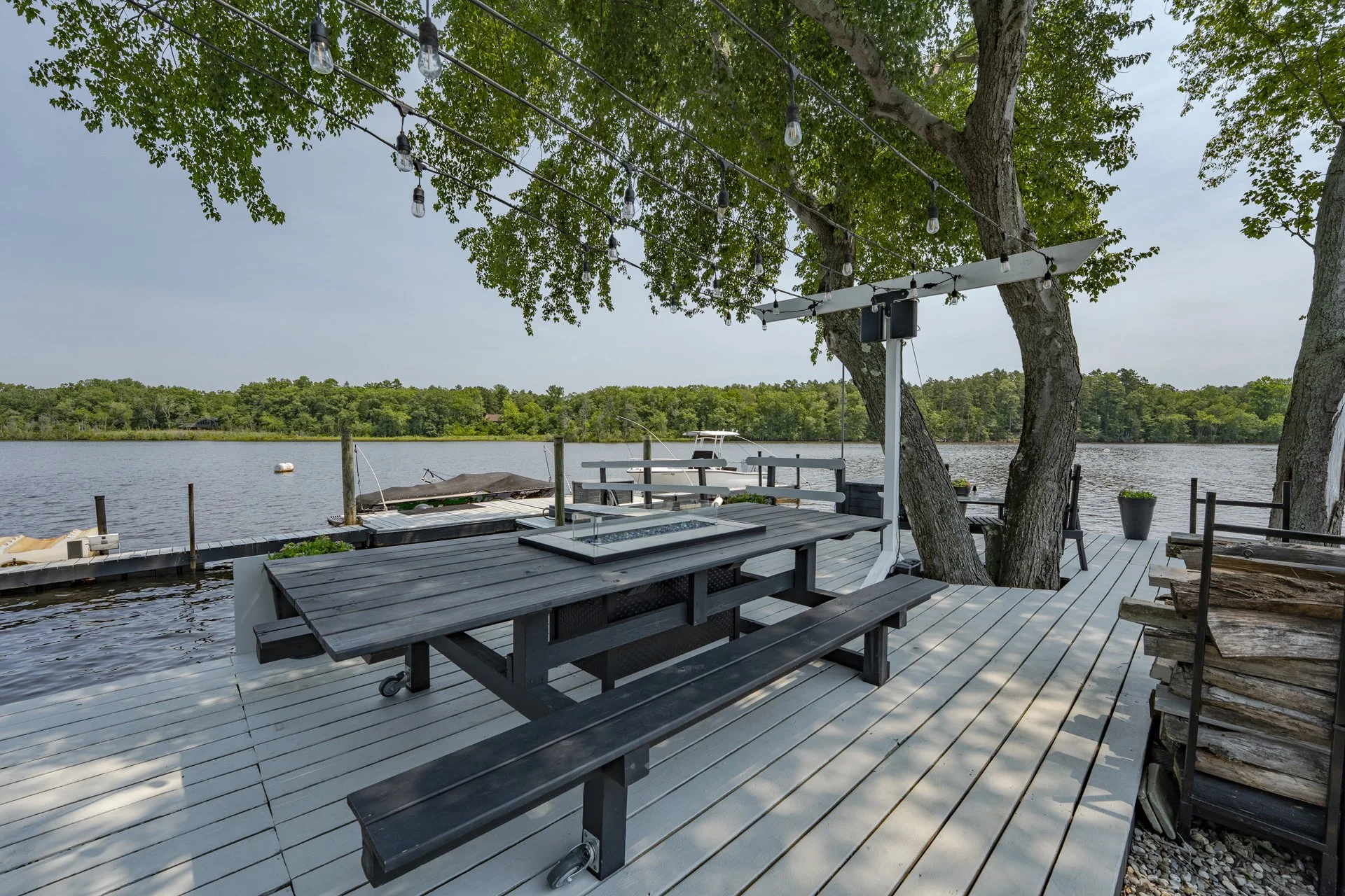Private dock system, drive-through boathouse, and direct boat ramp access to the Mullica River.