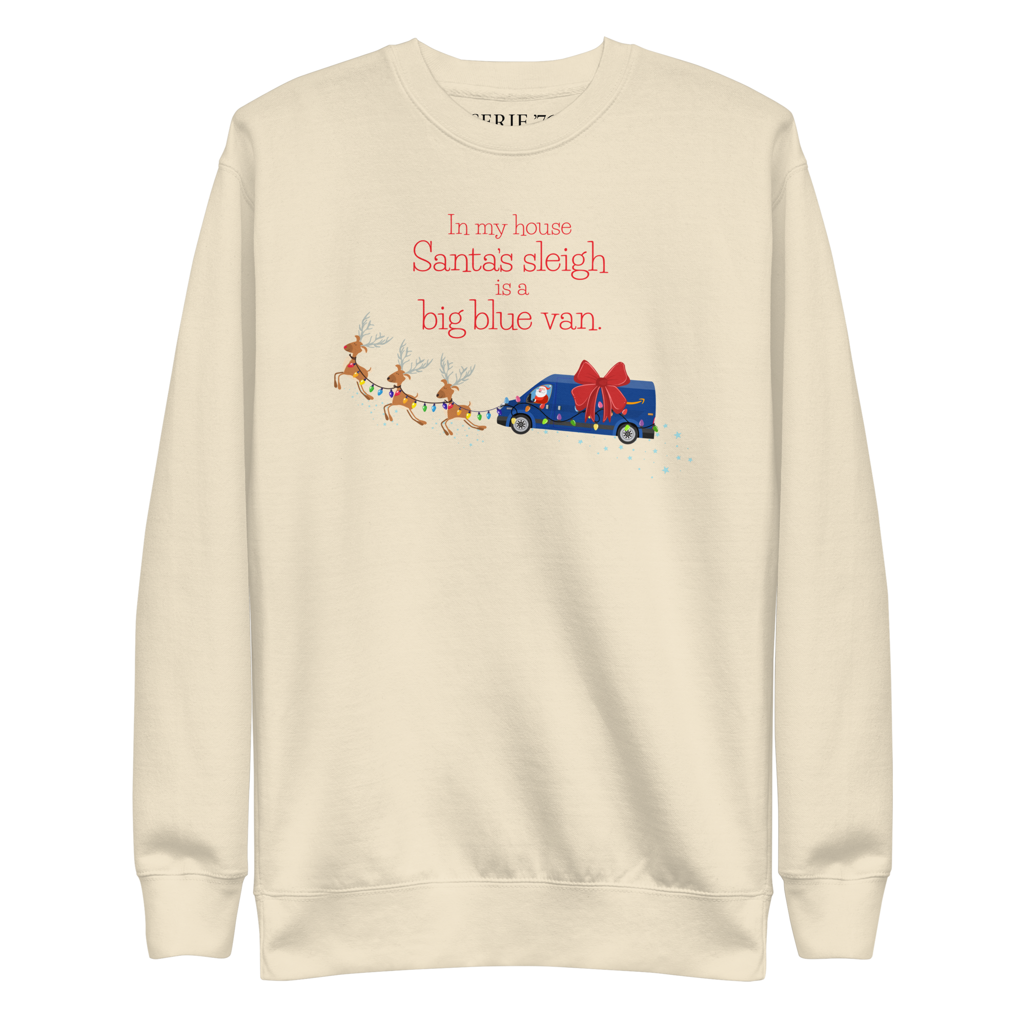 Cream colored sweatshirt with a graphic of a blue van being driven by Santa Claus and pulled by Reindeer.