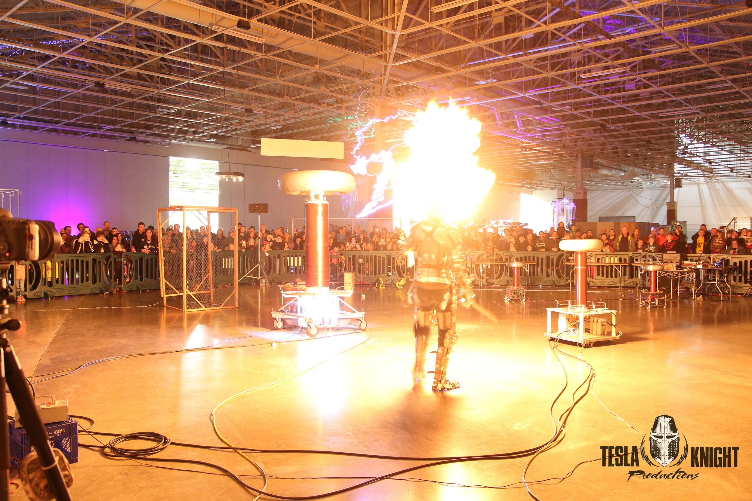 The Tesla Knight exploding a propane balloon with the arcs from tesla coils at Makerfaire Milwaukee 2018