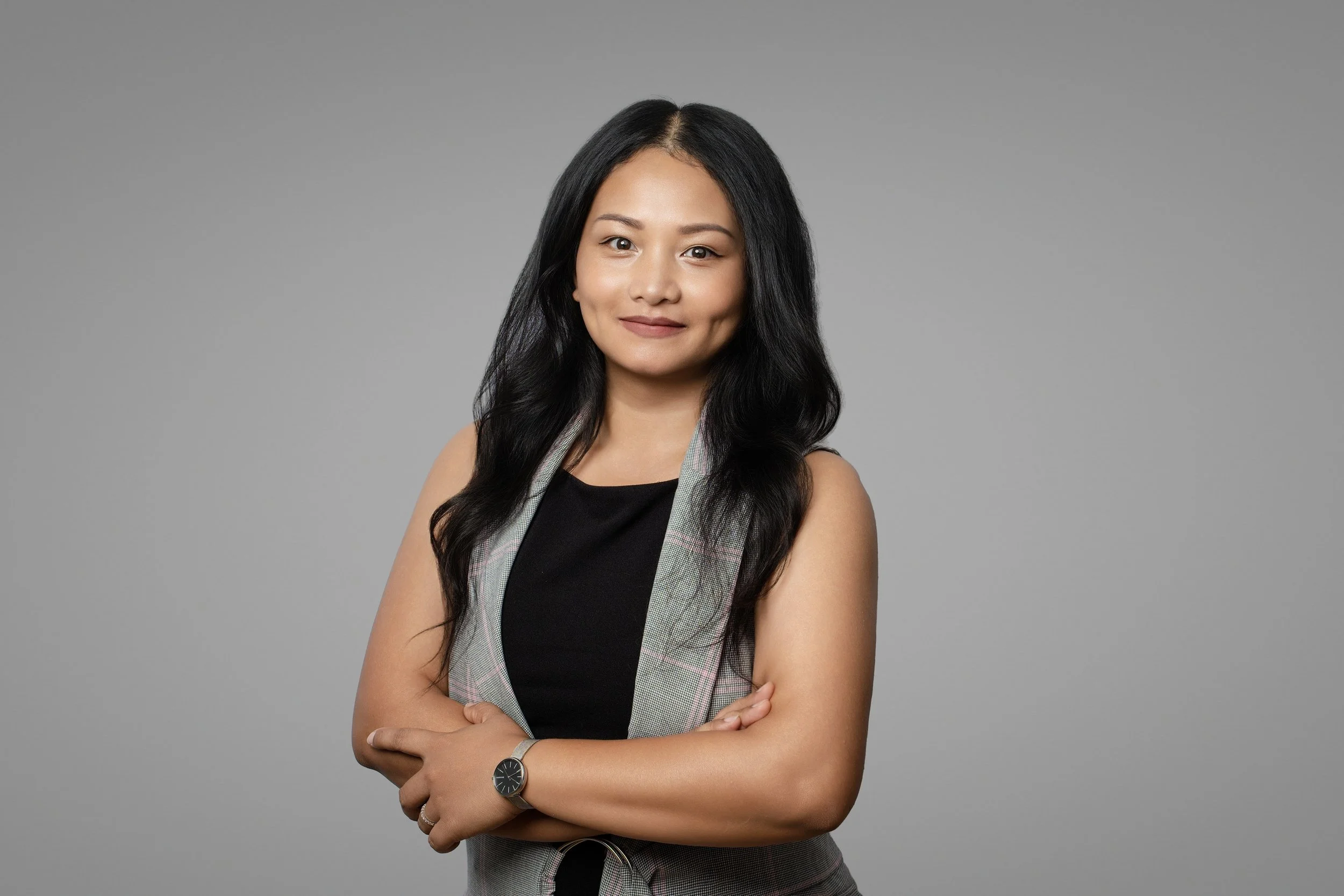 happy woman with arms crossed