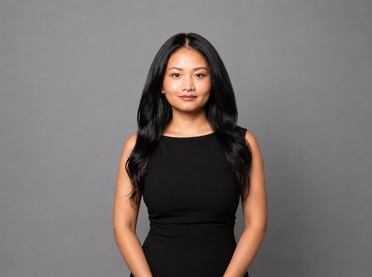 Confident woman in black dress