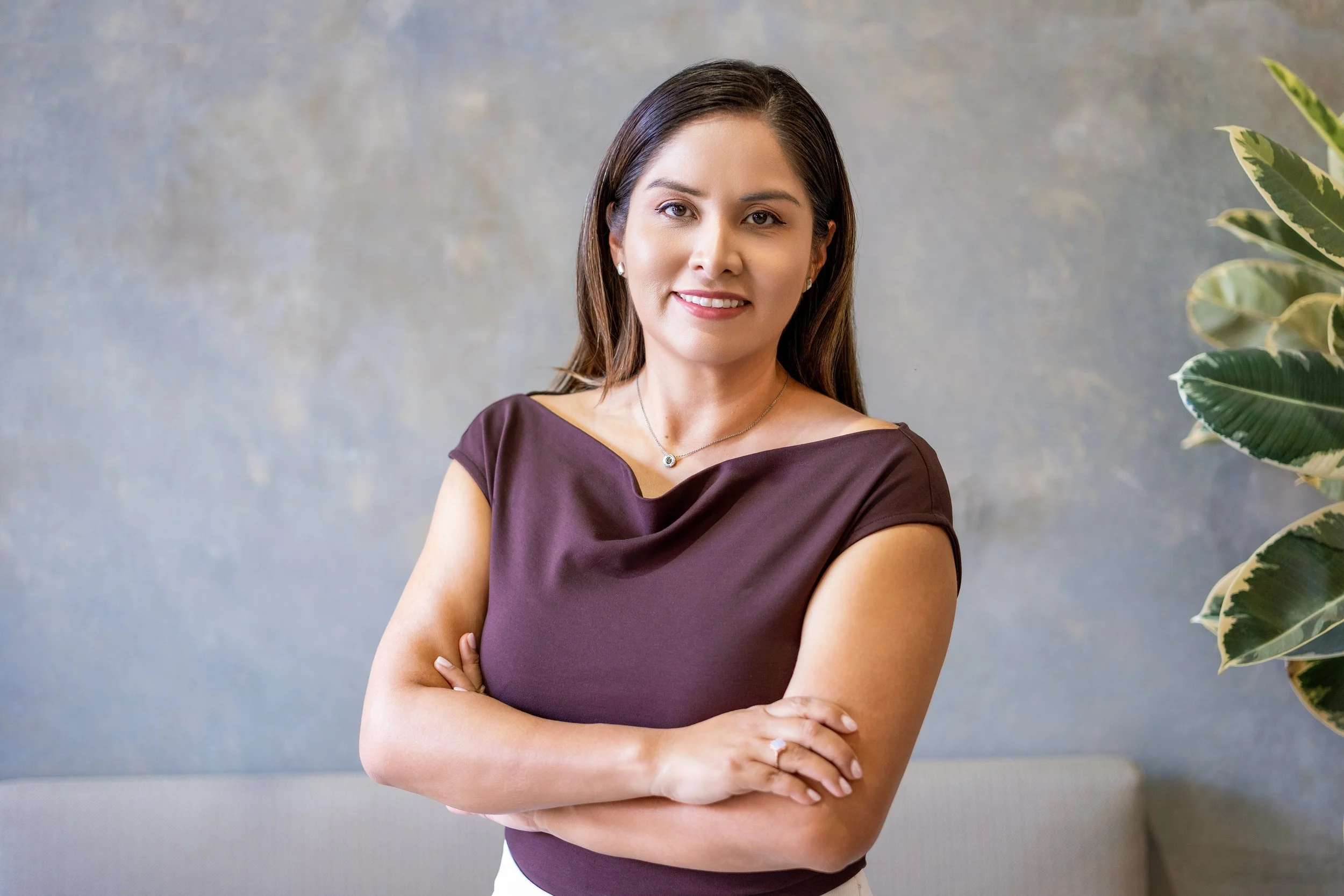 Confident woman with arms crossed