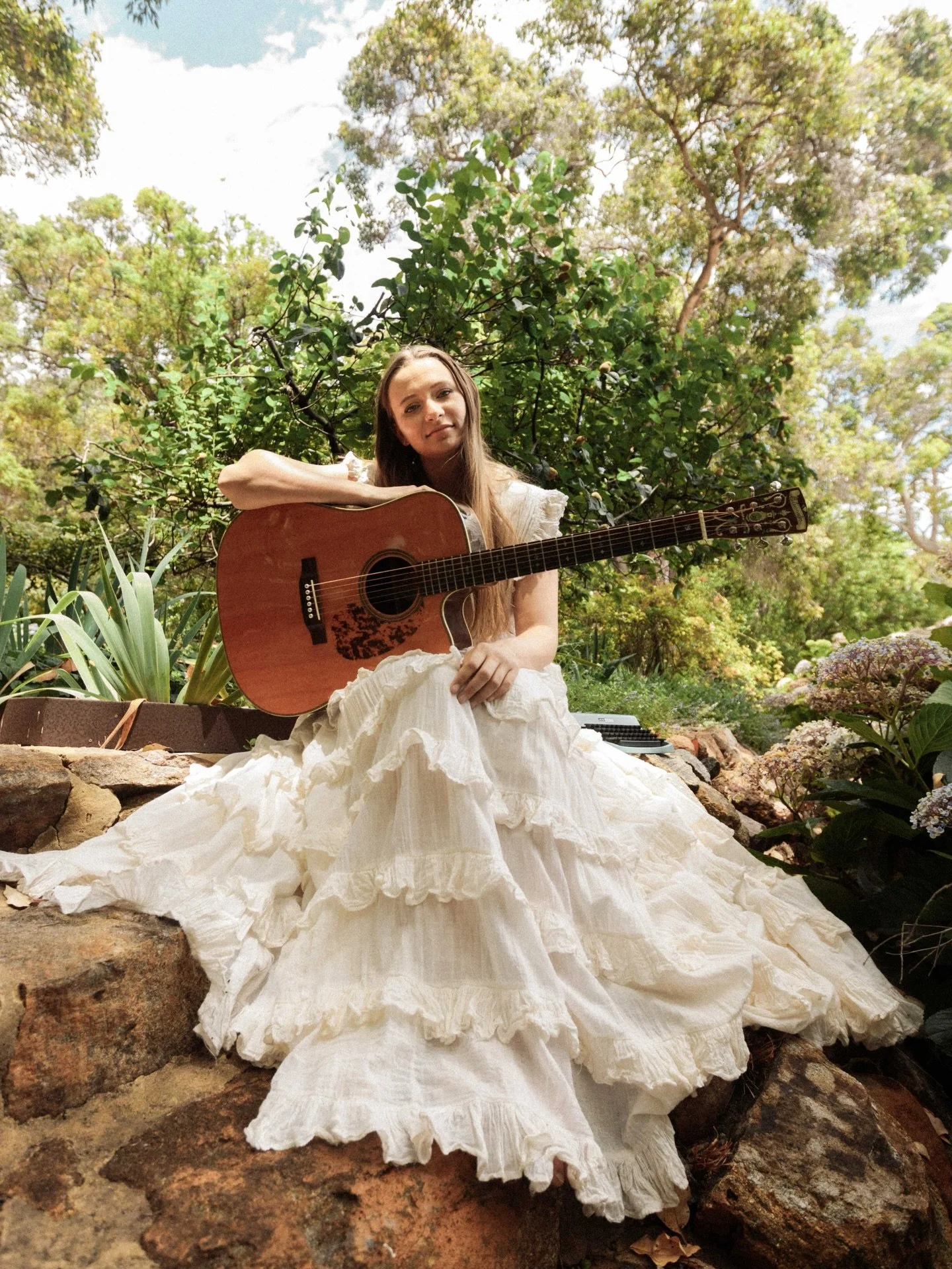 Reminiscing this beaut photoshoot I did with @byronbearfist last year! Just me with my two favourite things - my guitar and my typewriter 🧚🏻

This Thursday I have the privilege of opening my beautiful friends @georginadacheff &lsquo;KNOWING NO THIN
