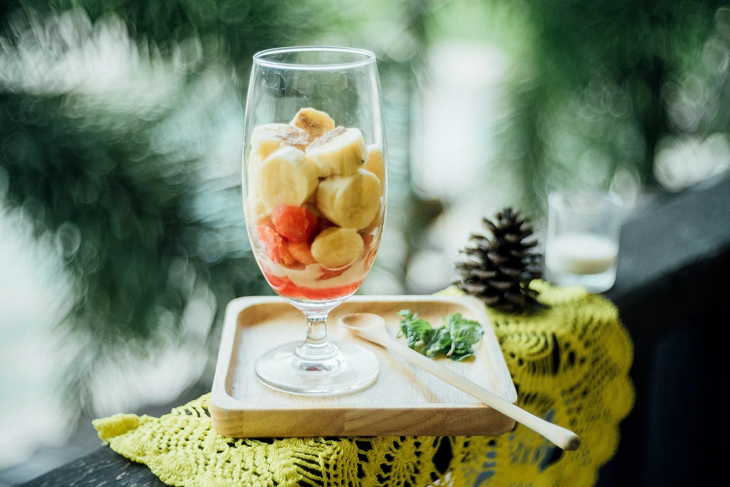 Sliced fruit in a clear glass.
