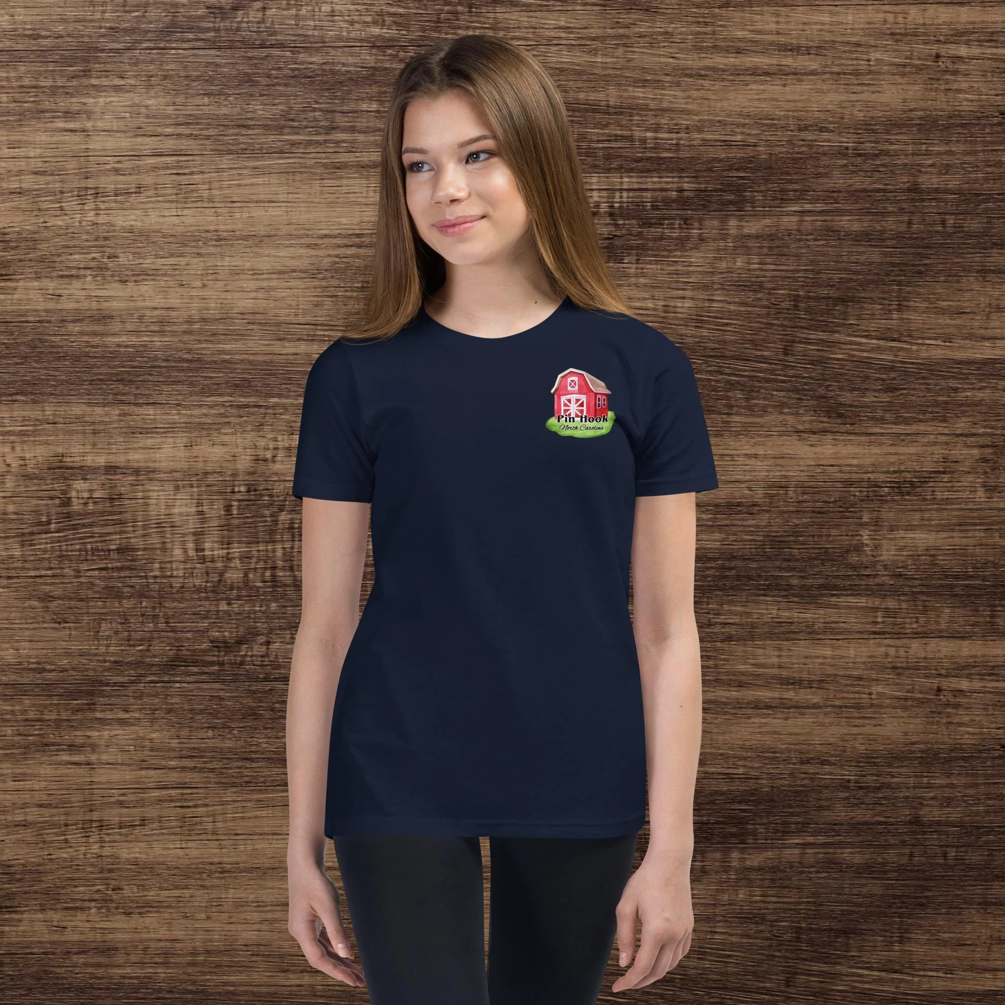 youth-staple-tee-navy-front-6511b1bfeaa81.jpg