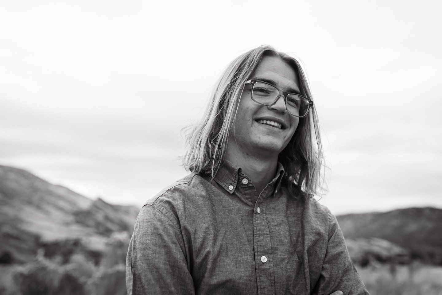 Sam made this senior photo session easy and breezy. Literally it was breezy and cold at Mt. Falcon East,  but the ease in which he carries himself and his fantastic smile made it such a pleasure. ⁠
⁠
#Denverseniorphotos #classof2026 #seniorinspire #g