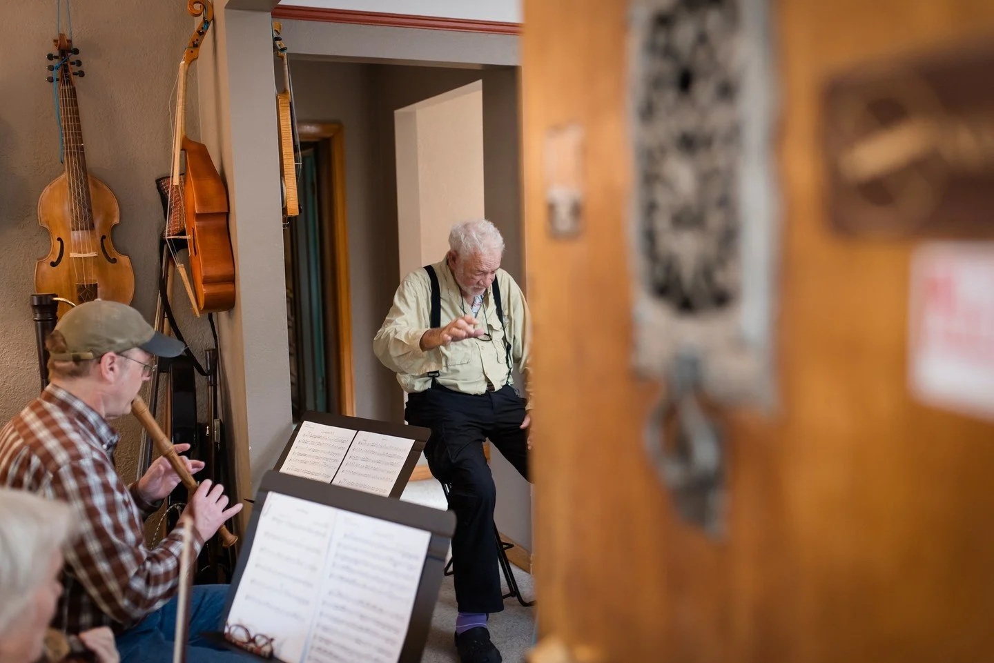 Every Saturday morning, multi-talented musician and West Highland resident Bill Concklin makes magic with abou t adozen other musicians in the living room of this home. Bill is the founder of The Highlands Chamber Orchestra, a group of local musician