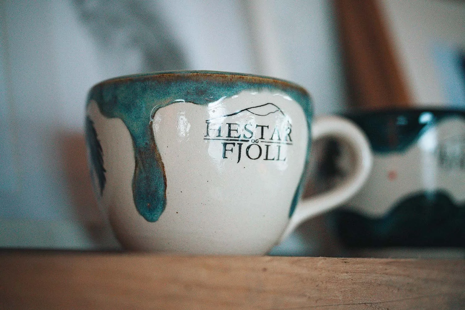 A Hestar og Fjöll branded cup