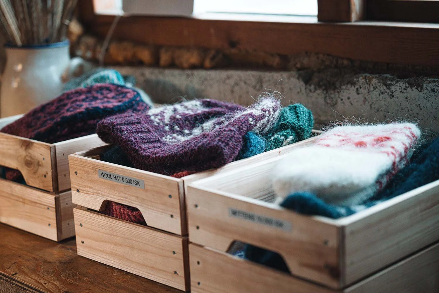 Boxes full of wool hats